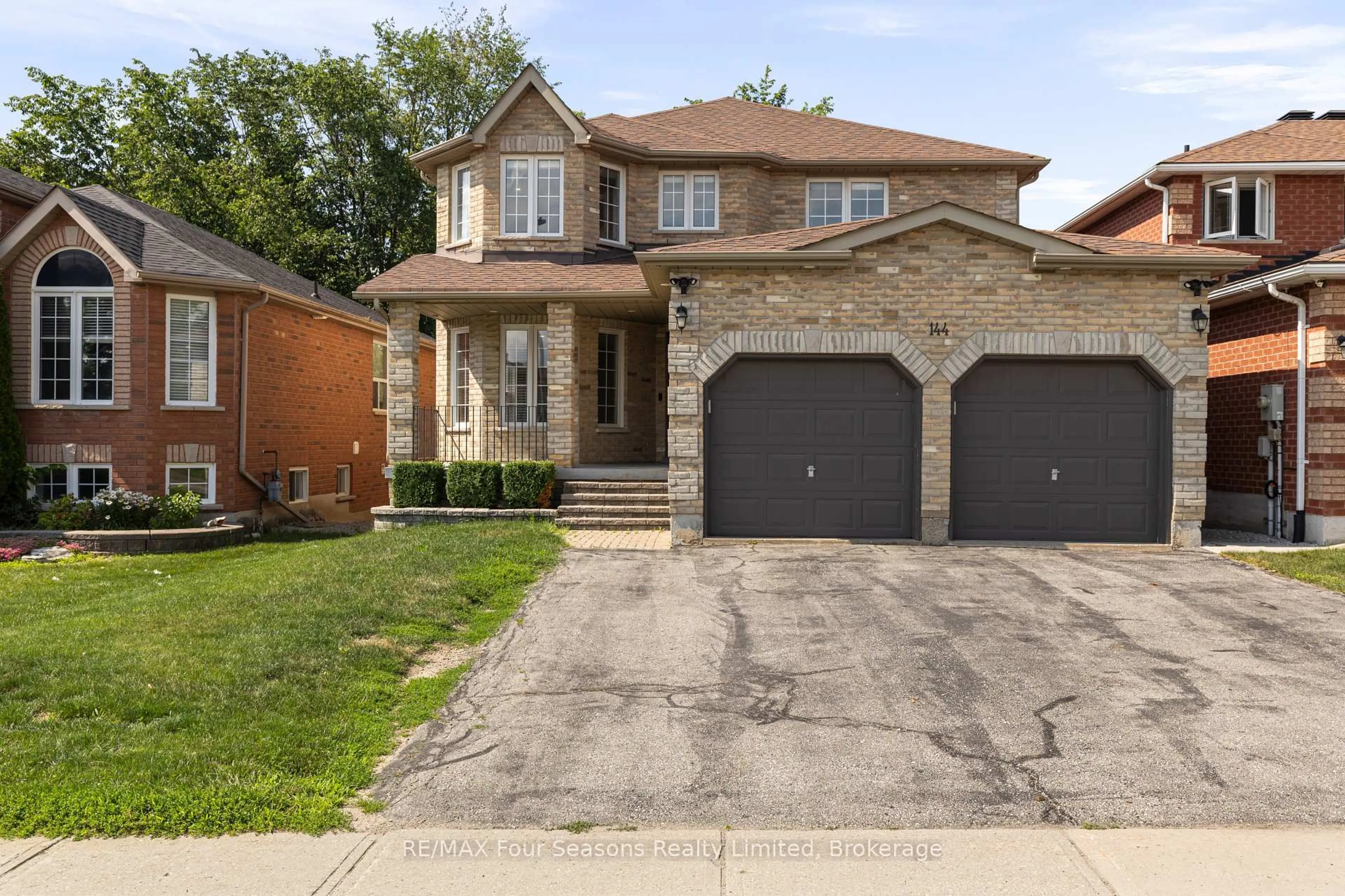 Home with brick exterior material, street for 144 Country Lane, Barrie Ontario L4N 0N1
