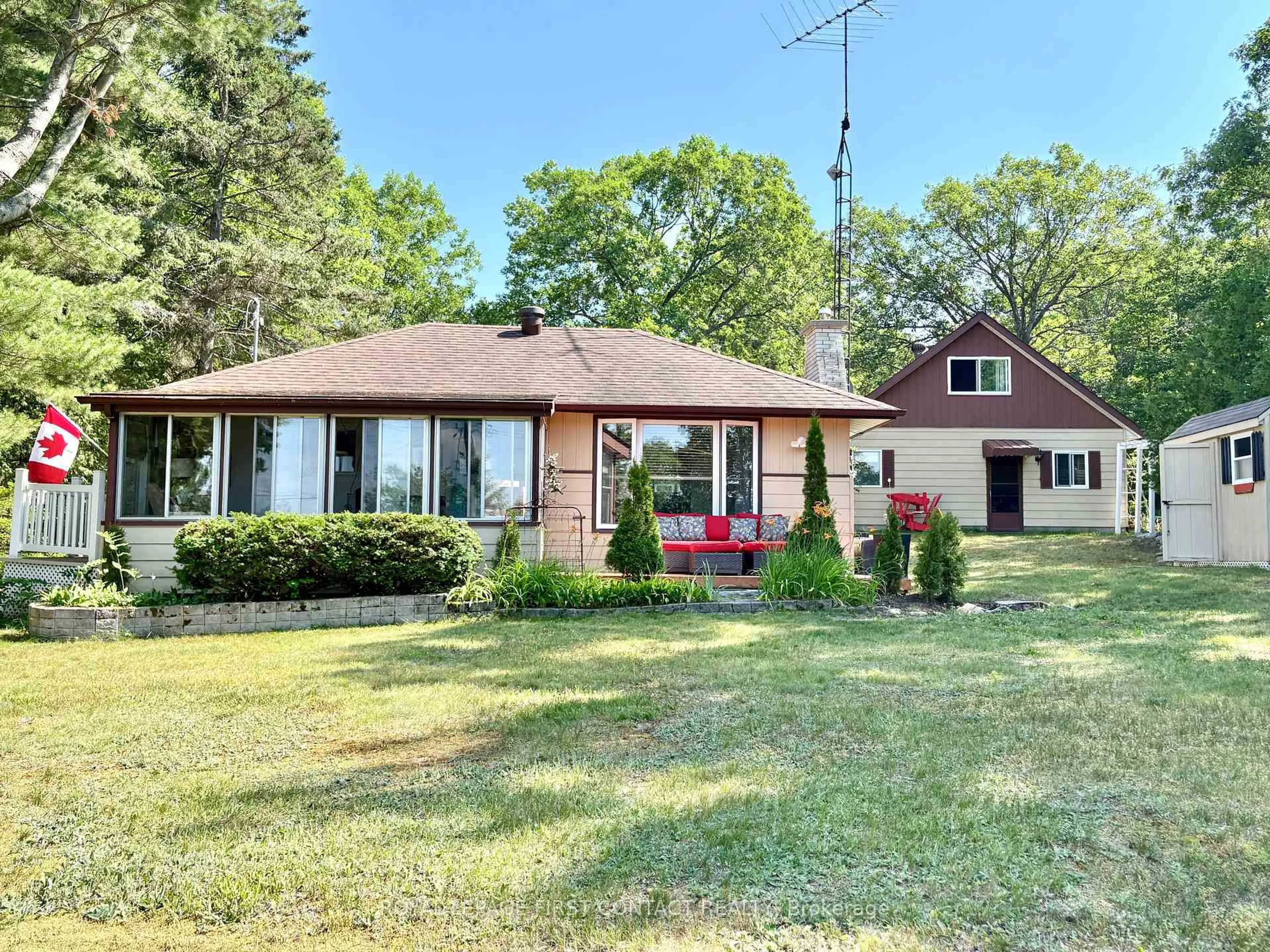 A pic from outside/outdoor area/front of a property/back of a property/a pic from drone, street for 1987 Champlain Rd, Tiny Ontario L9M 0B6