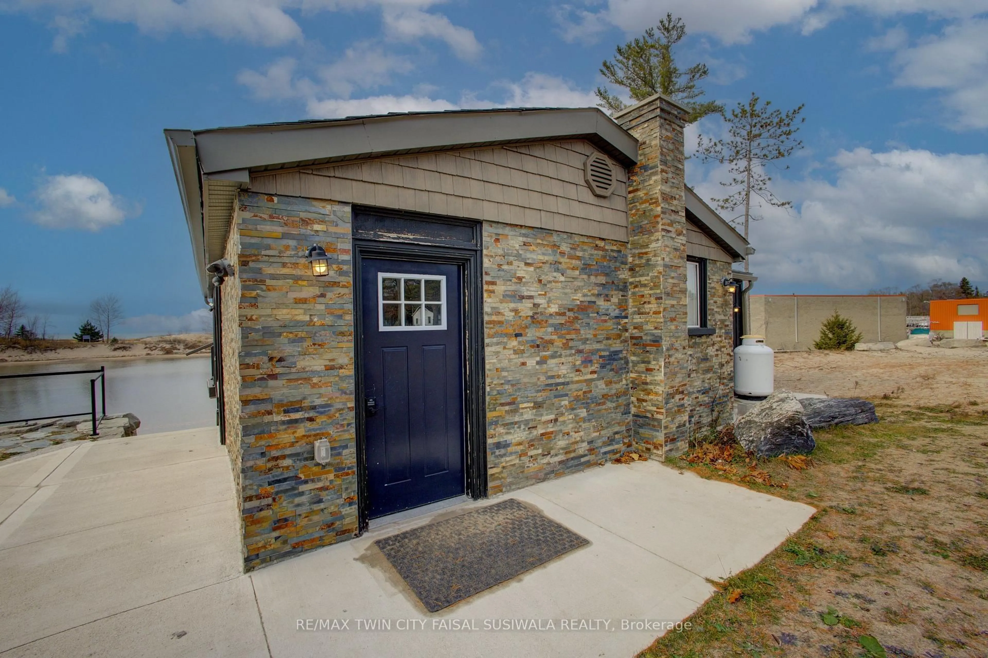 Home with brick exterior material, building for 4 Browns Lane, Wasaga Beach Ontario L9Z 2L8