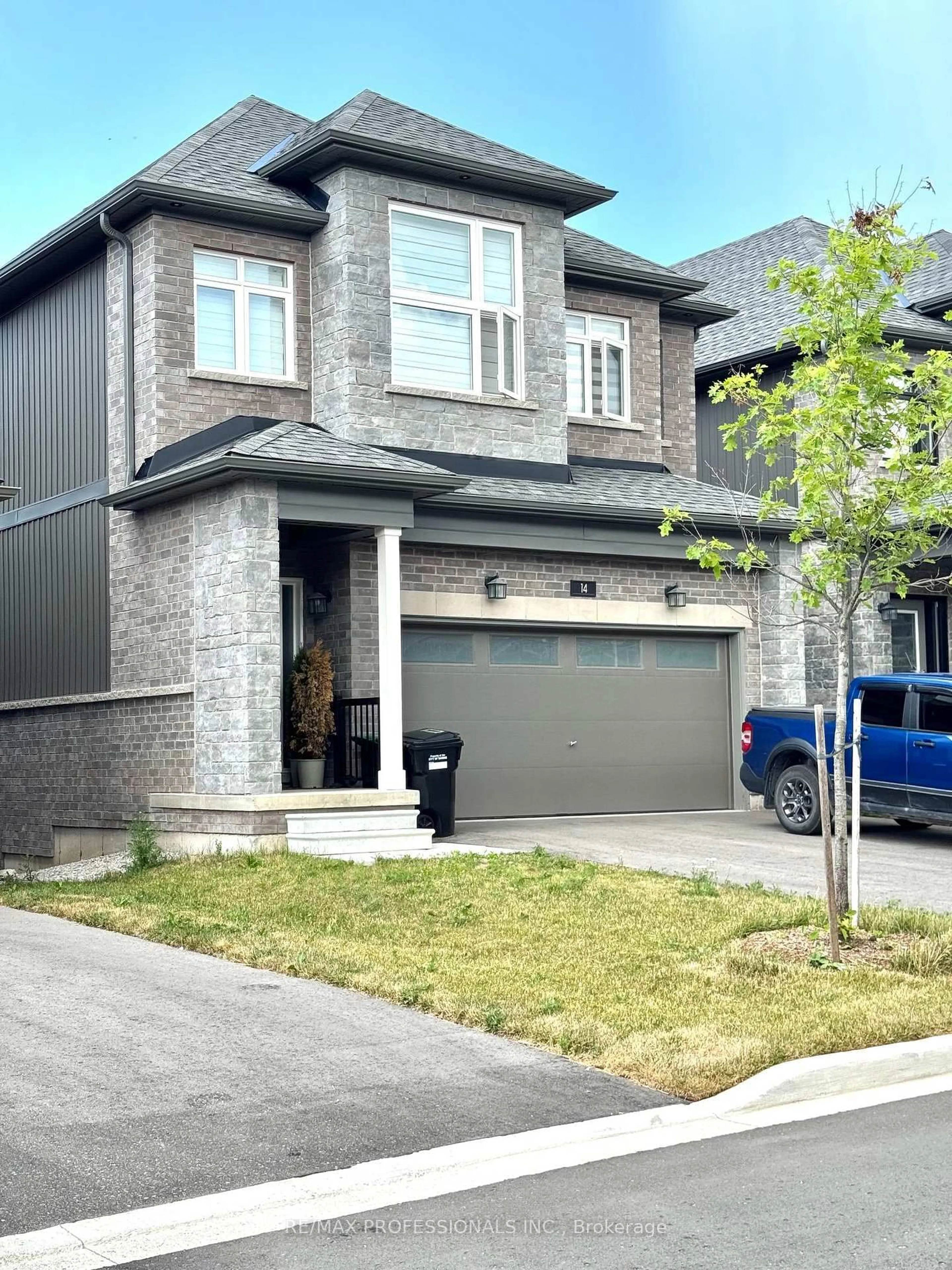Home with brick exterior material, street for 14 Barnyard Tr, Barrie Ontario L9J 0T4