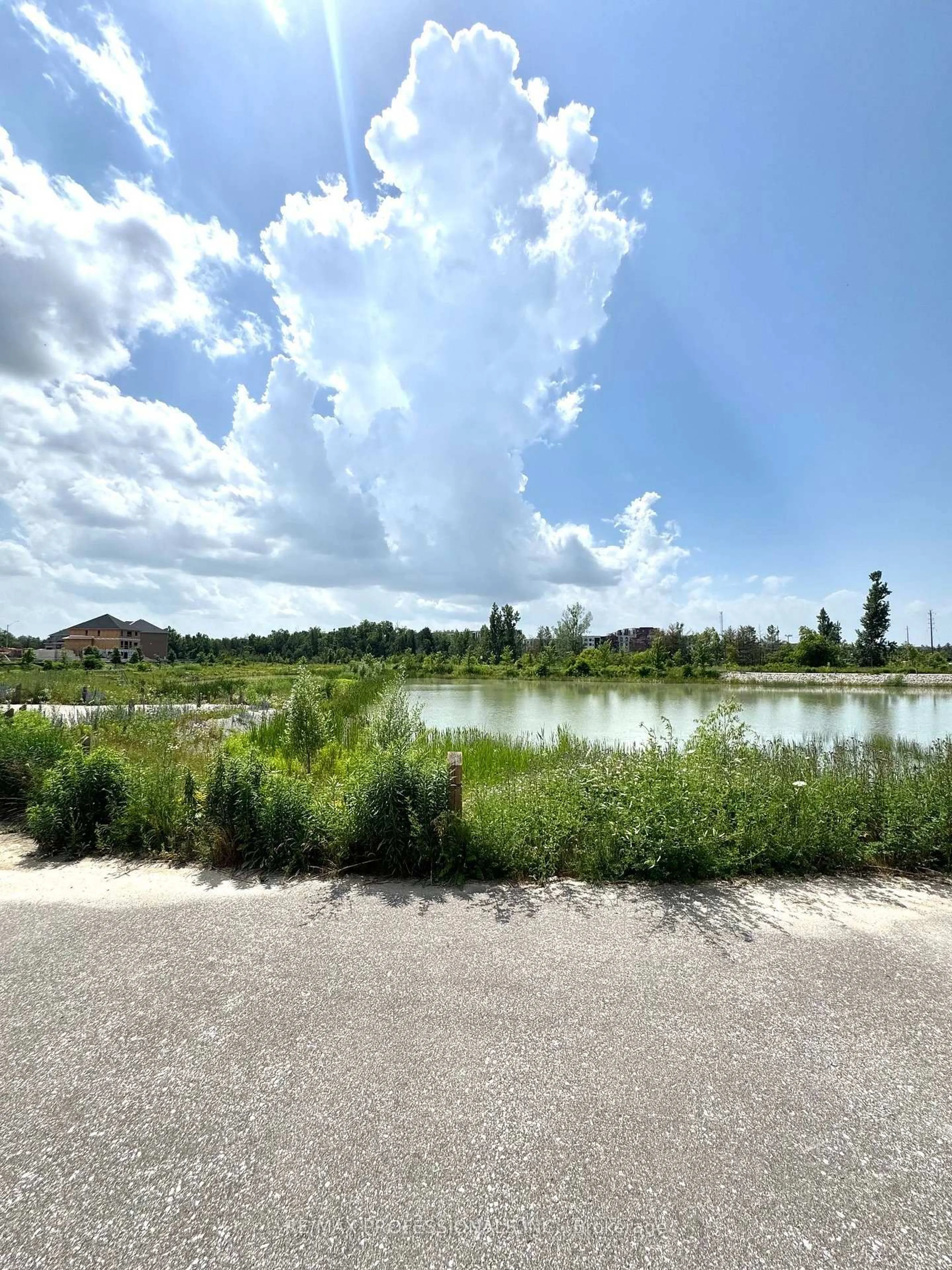 A pic from outside/outdoor area/front of a property/back of a property/a pic from drone, water/lake/river/ocean view for 14 Barnyard Tr, Barrie Ontario L9J 0T4