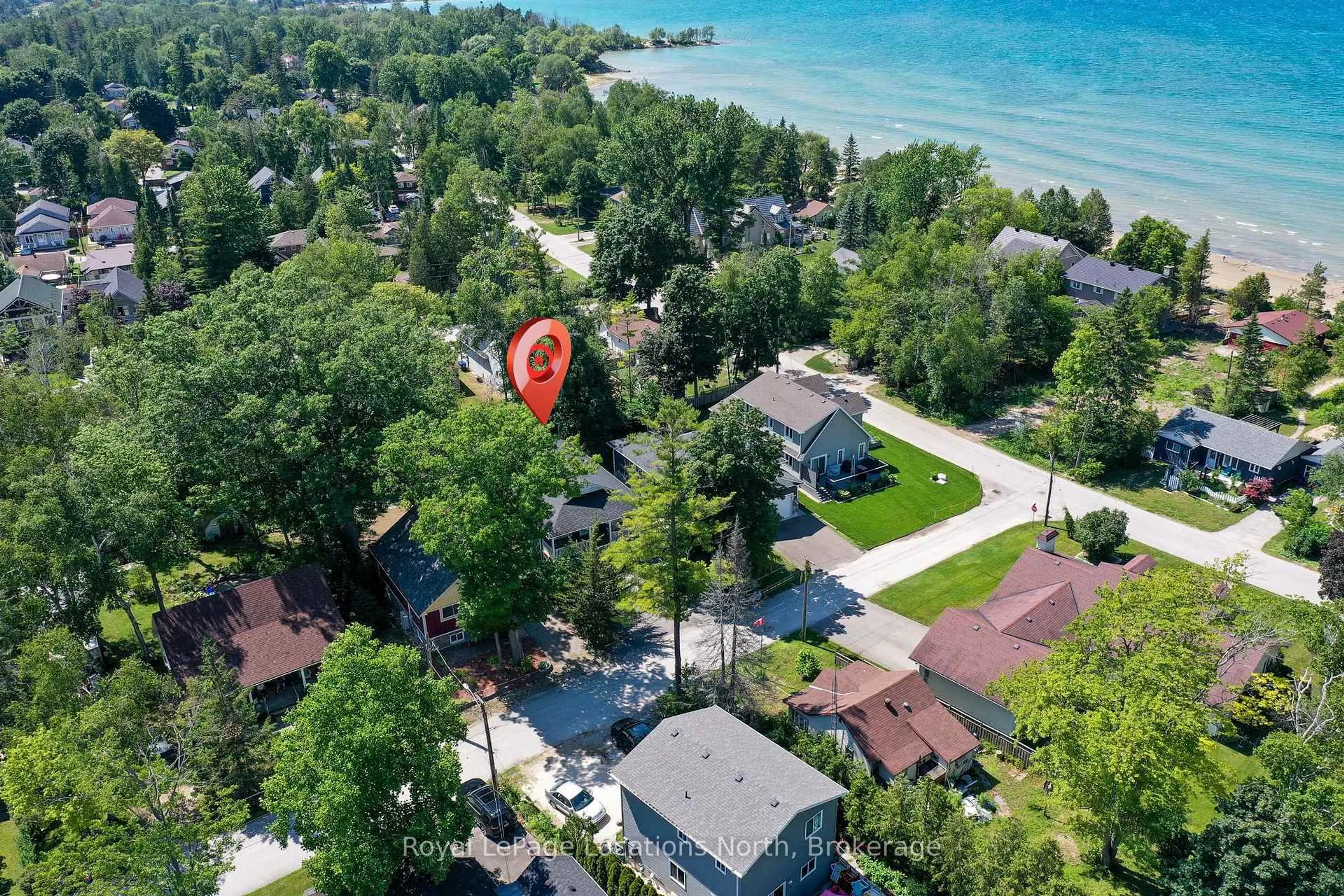 A pic from outside/outdoor area/front of a property/back of a property/a pic from drone, water/lake/river/ocean view for 12 65th St, Wasaga Beach Ontario L9Z 1V2