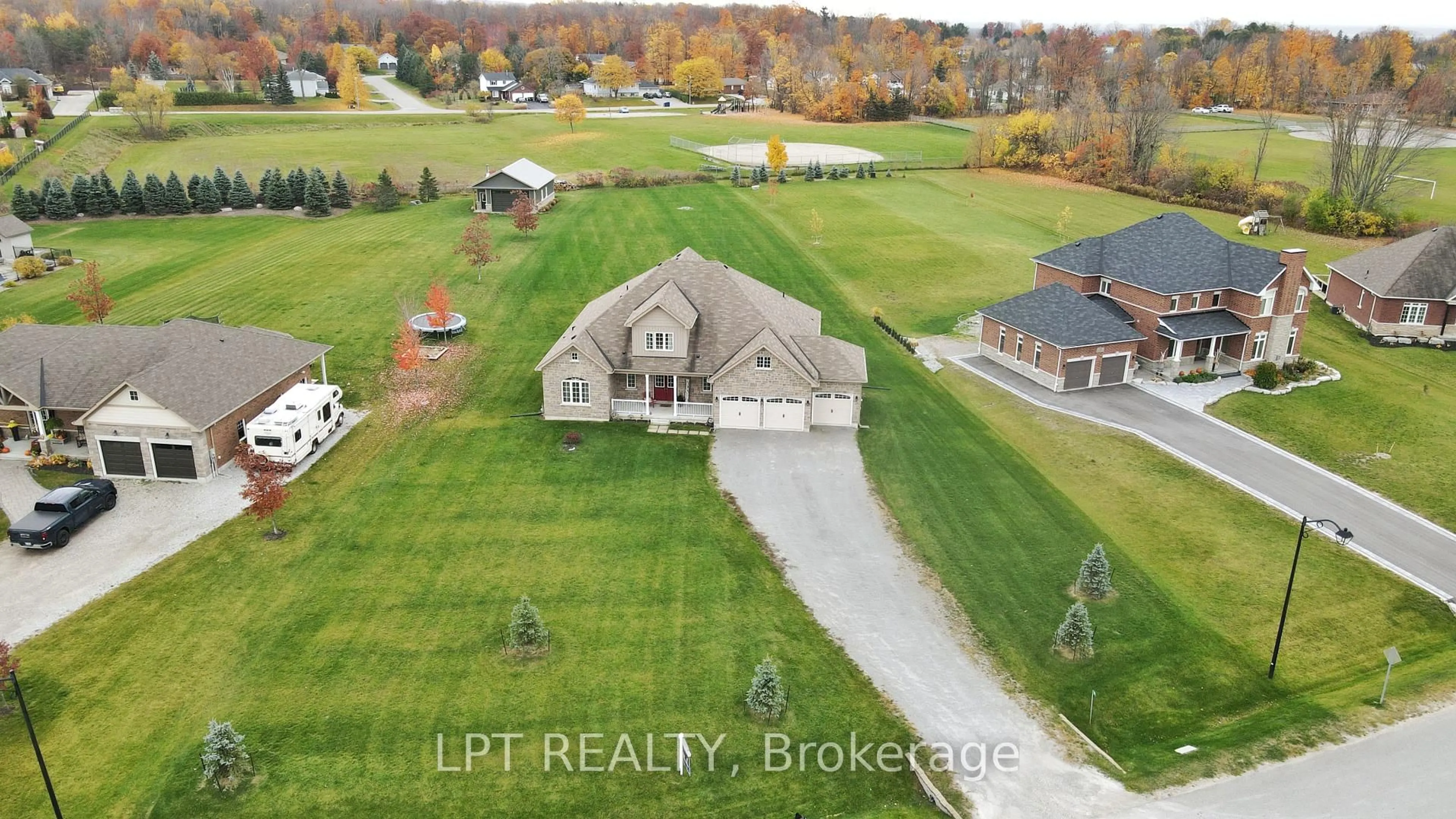 A pic from outside/outdoor area/front of a property/back of a property/a pic from drone, unknown for 12 Plowright Rd, Springwater Ontario L9X 0A3