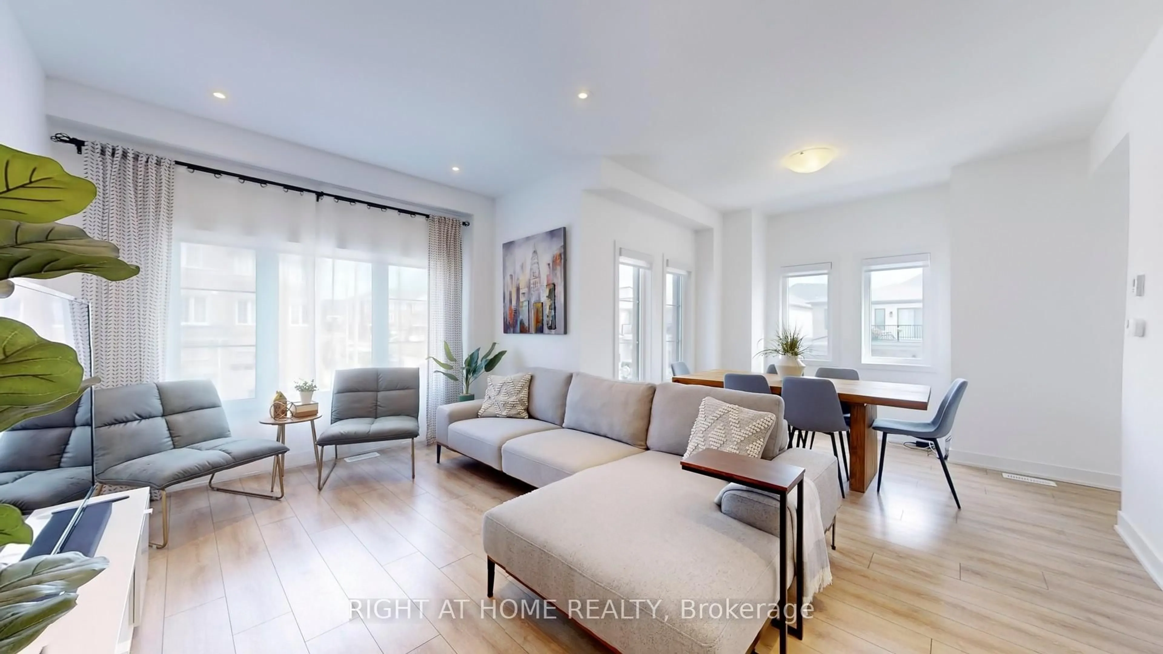 Living room with furniture, wood/laminate floor for 1 PUMPKIN CORNER Cres, Barrie Ontario L9J 0T5