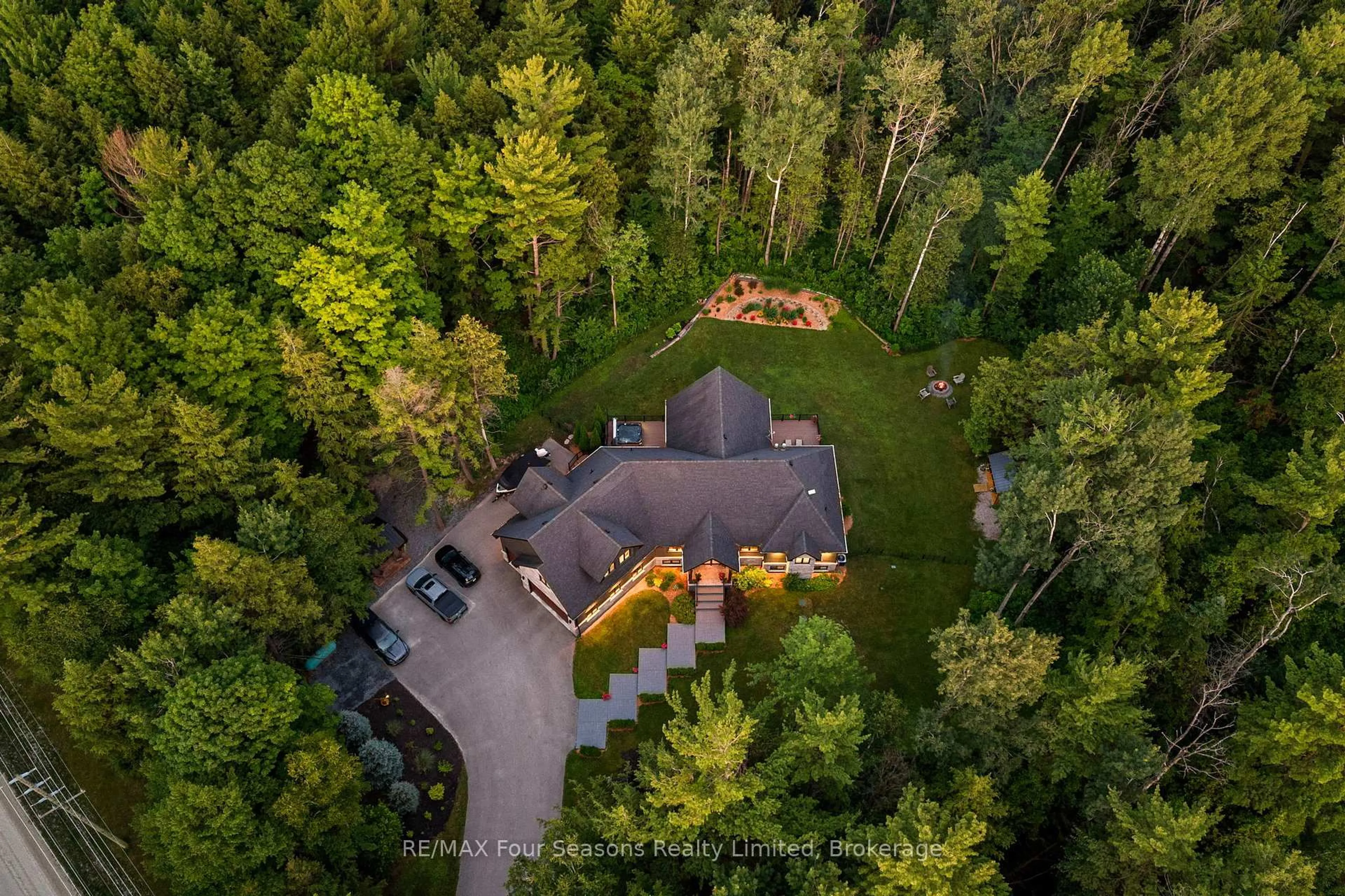 A pic from outside/outdoor area/front of a property/back of a property/a pic from drone, forest/trees view for 6155 27/28 Nottawasaga Sdrd, Clearview Ontario L0M 1S0