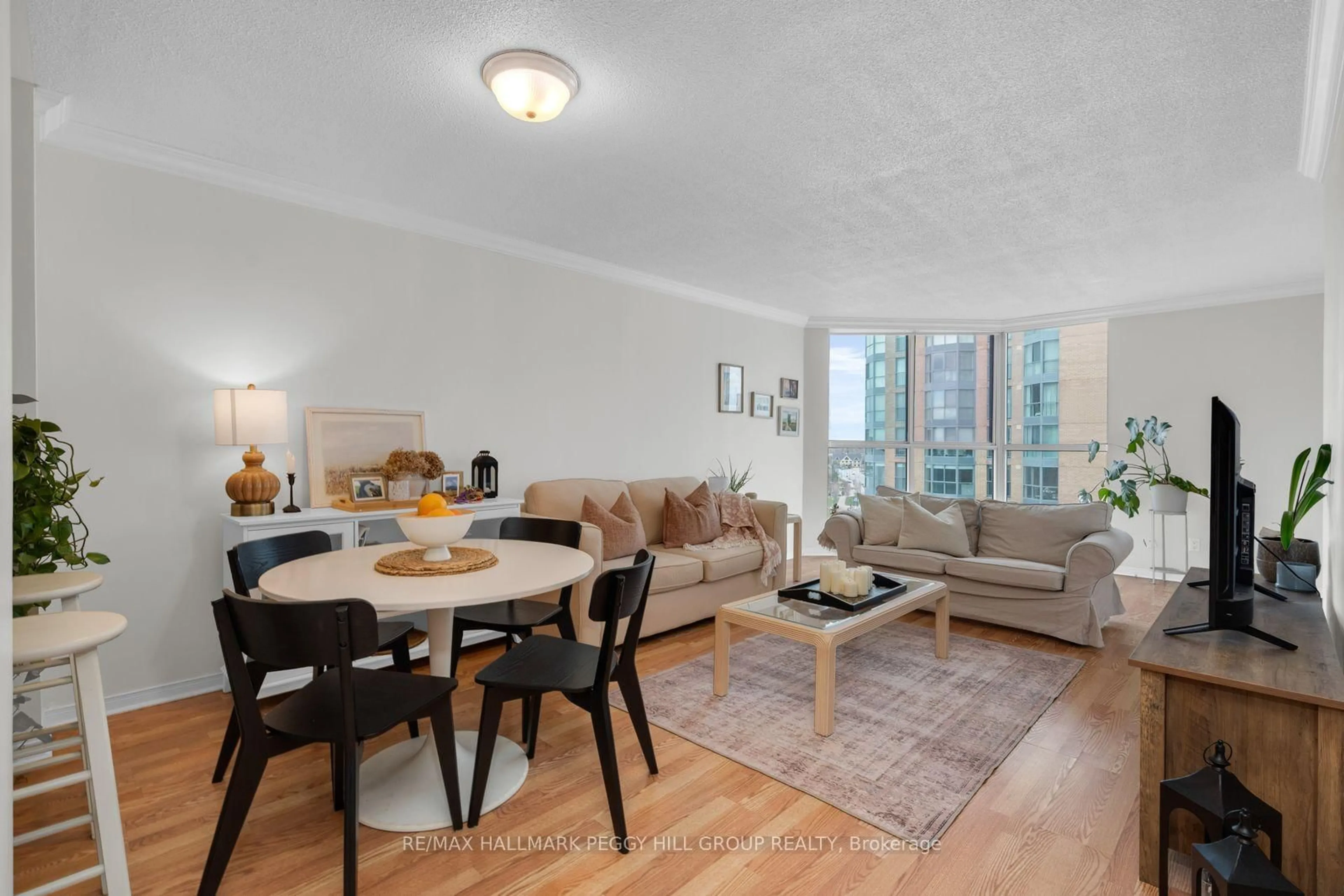 Living room with furniture, unknown for 150 Dunlop St #904, Barrie Ontario L4M 6H1