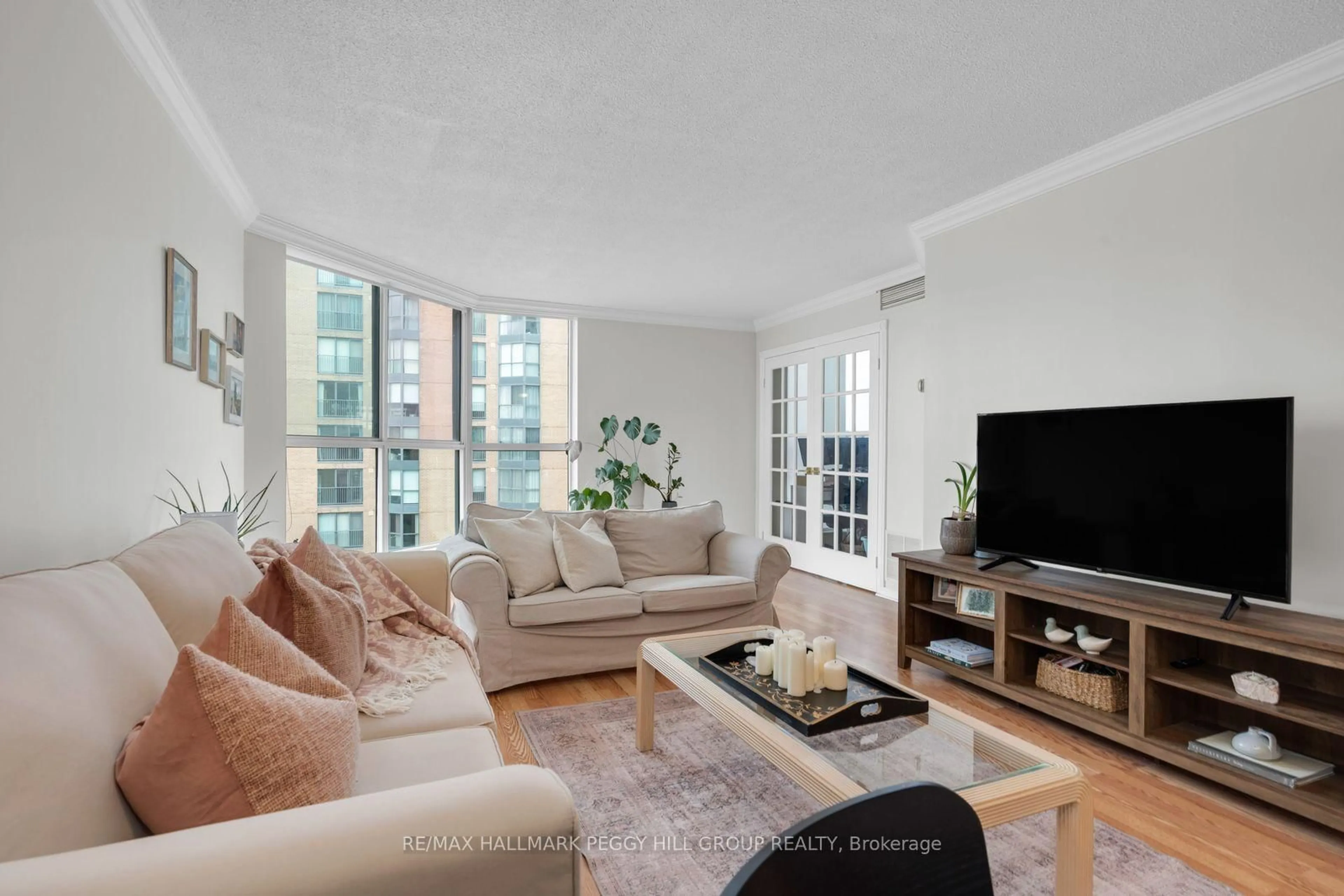 Living room with furniture, unknown for 150 Dunlop St #904, Barrie Ontario L4M 6H1