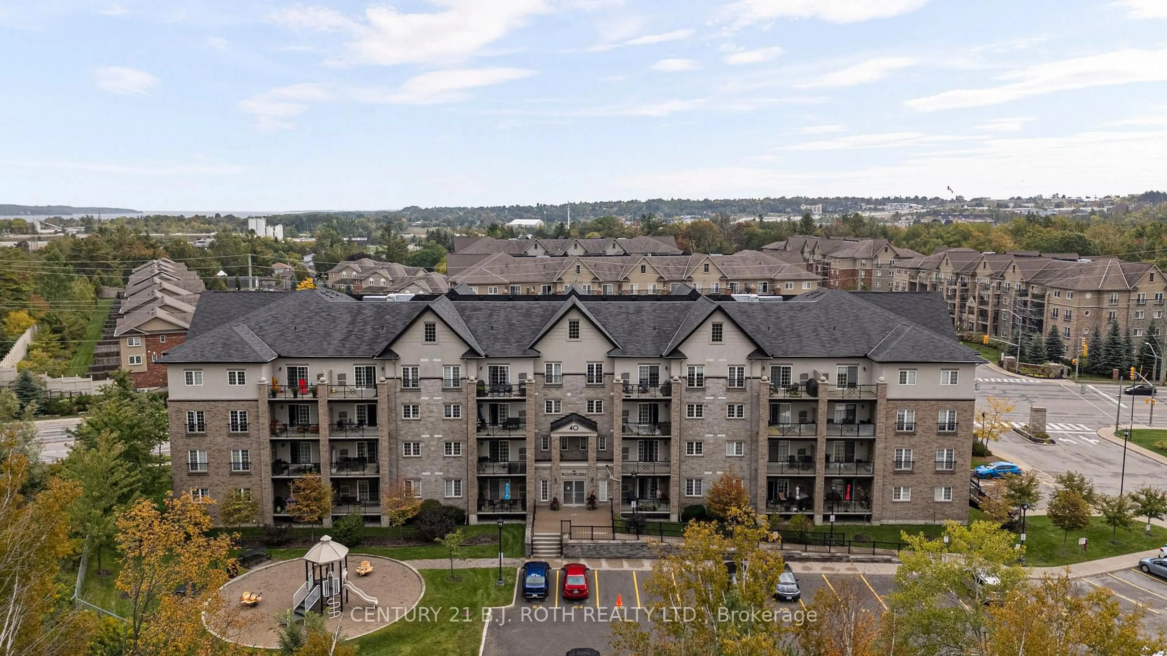 A pic from outside/outdoor area/front of a property/back of a property/a pic from drone, city buildings view from balcony for 40 Ferndale Dr #204, Barrie Ontario L4N 2L3