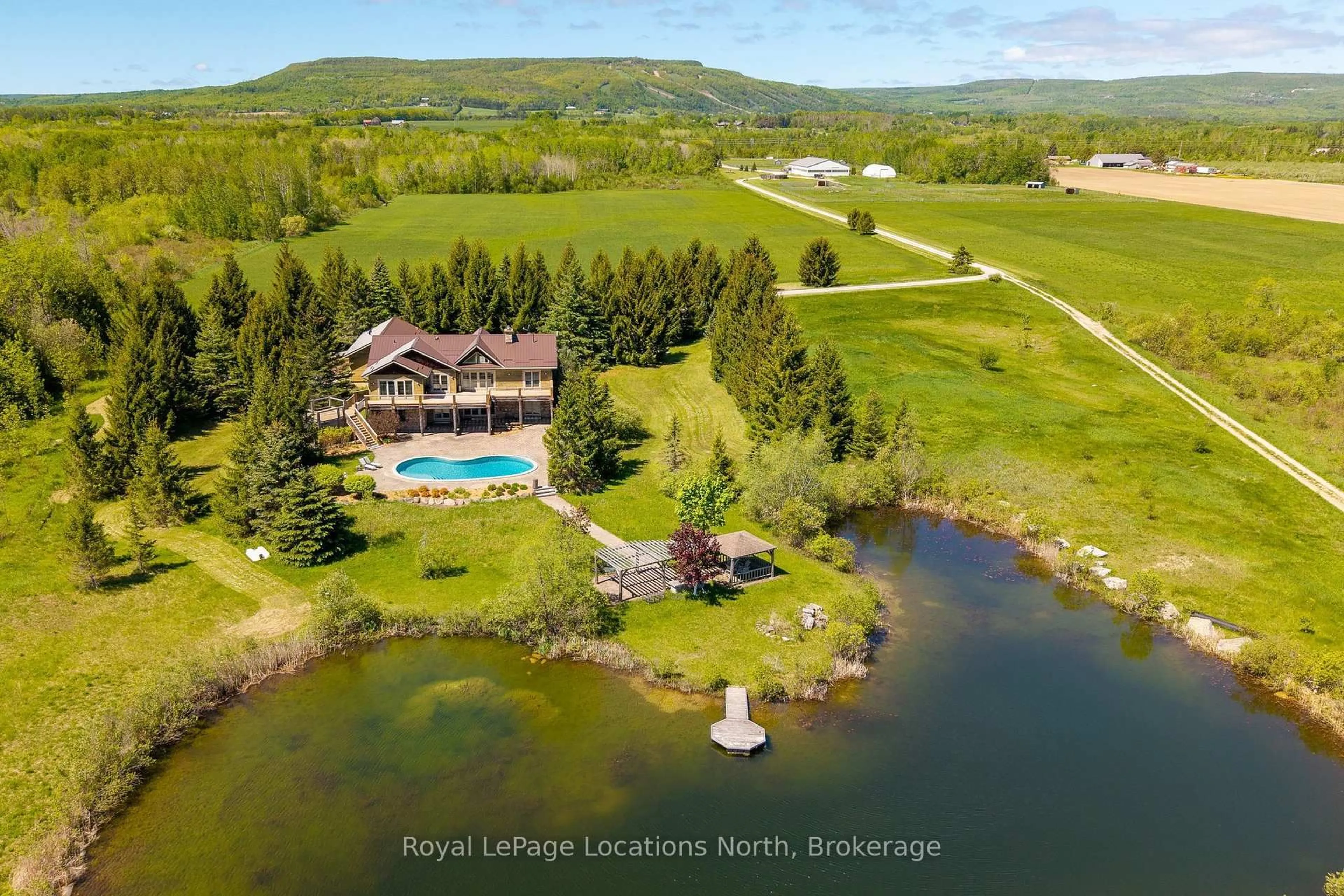 A pic from outside/outdoor area/front of a property/back of a property/a pic from drone, water/lake/river/ocean view for 2623 Con 10 N Nottawasaga Sdrd, Clearview Ontario L9Y 3Y9
