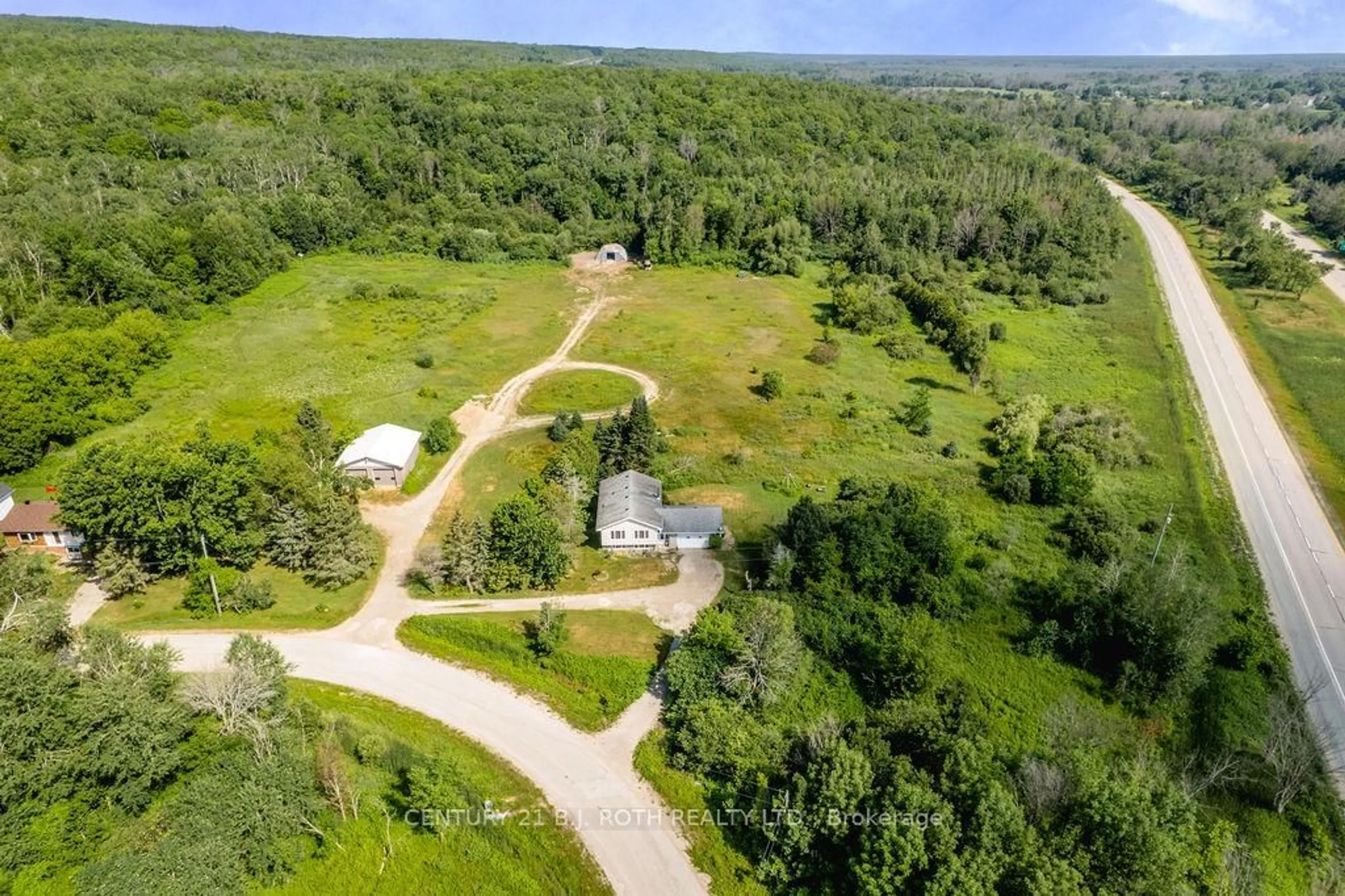 A pic from outside/outdoor area/front of a property/back of a property/a pic from drone, forest/trees view for 3400 Reservoir Rd, Severn Ontario L0K 1E0