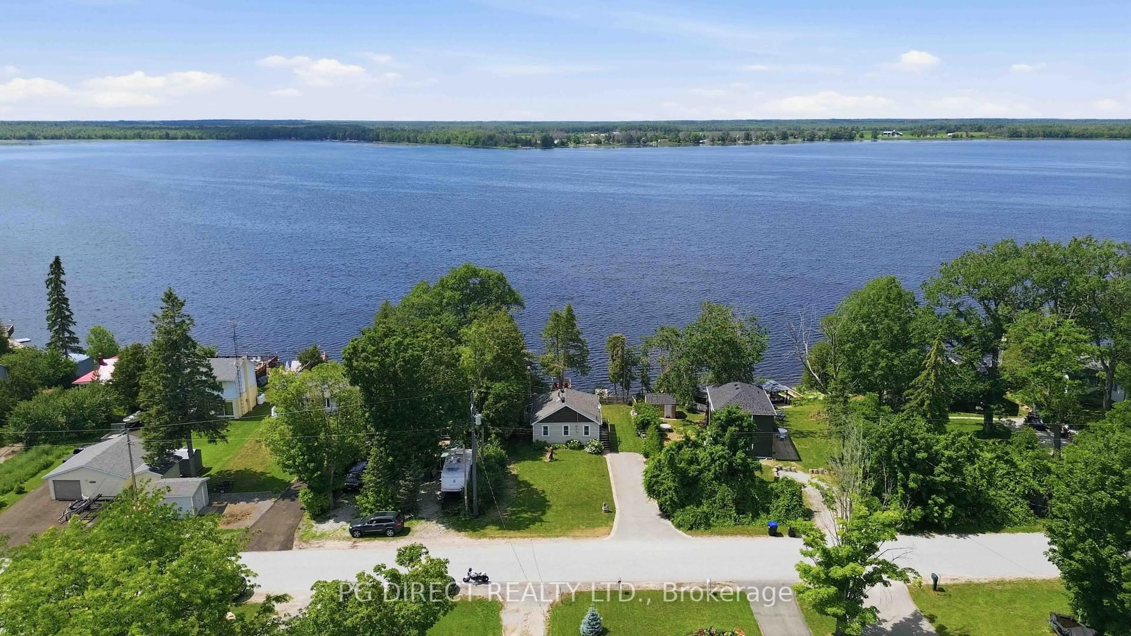 A pic from outside/outdoor area/front of a property/back of a property/a pic from drone, water/lake/river/ocean view for 1048 Sylvan Glen Dr, Ramara Ontario L0K 1B0