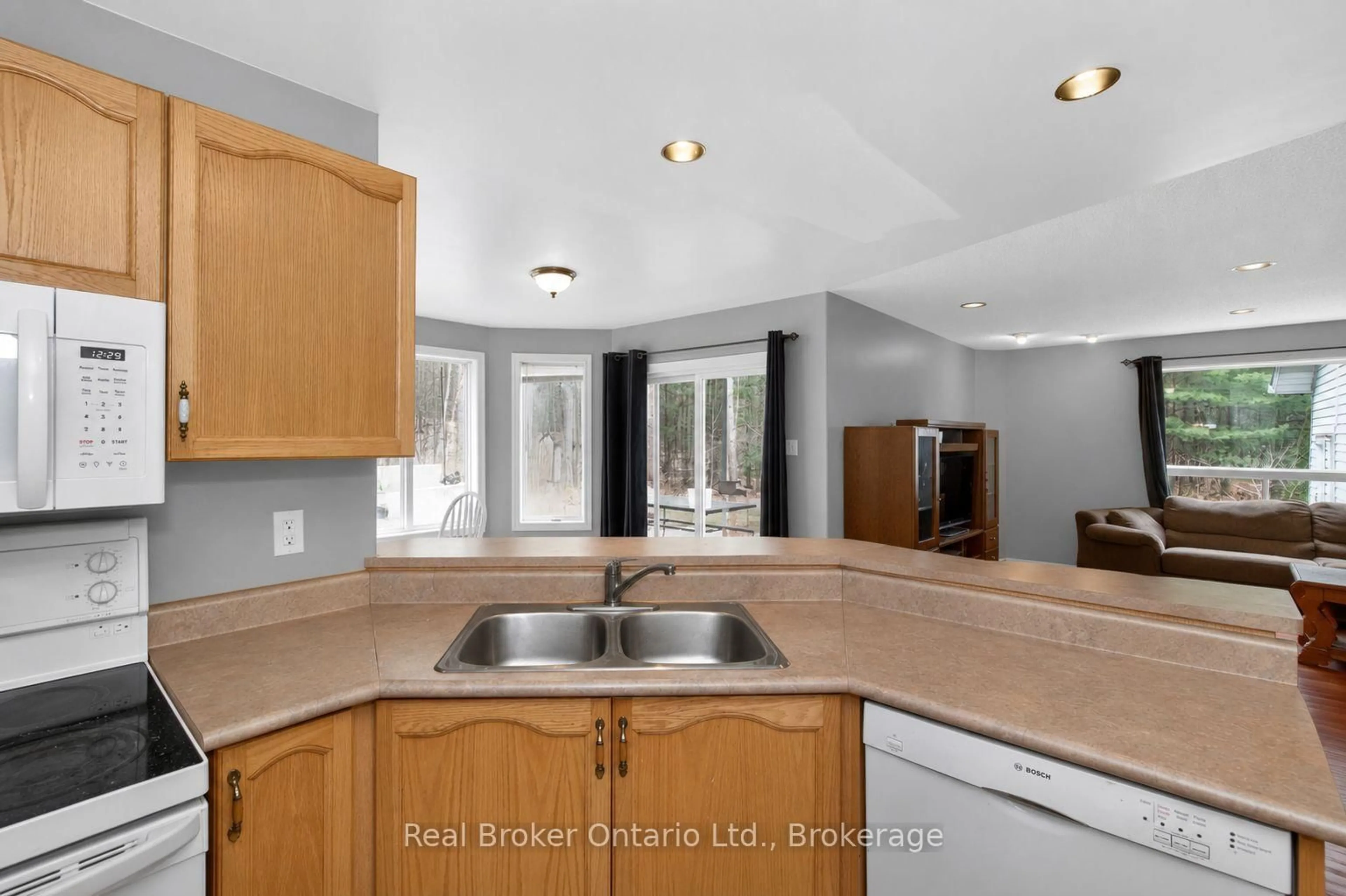 Open concept kitchen, unknown for 11 Campbell Crt, Springwater Ontario L0L 1V0