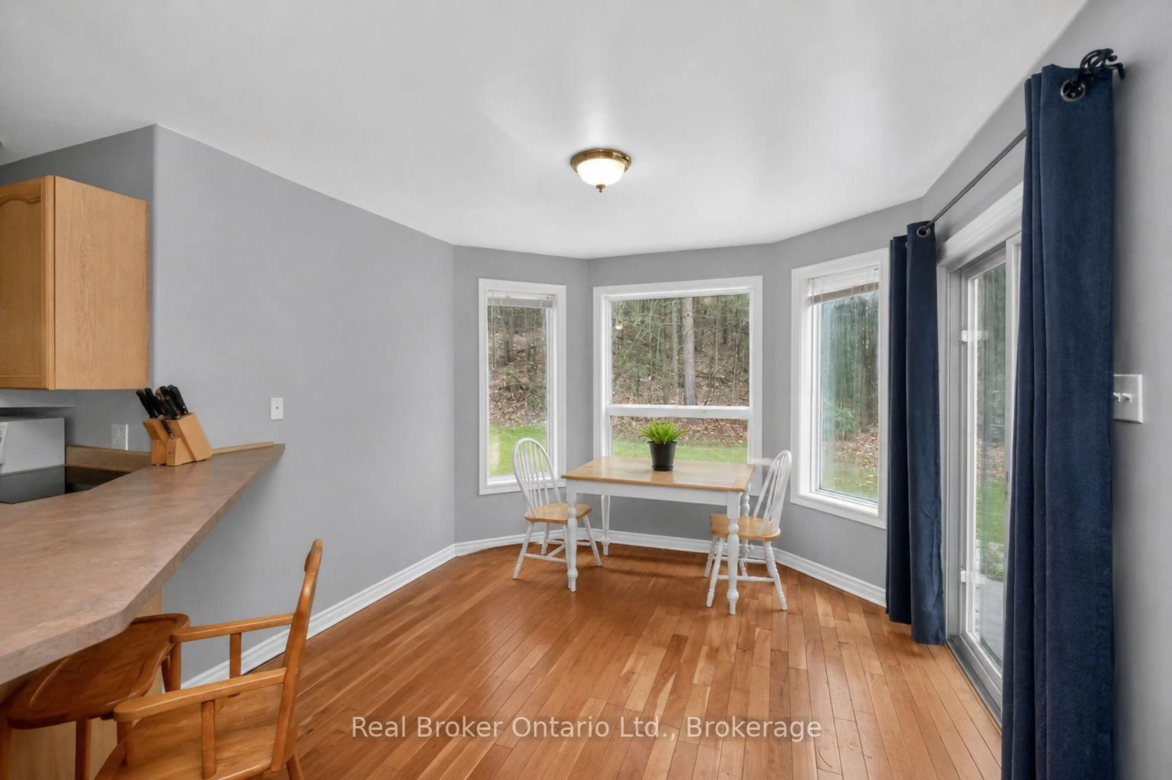 Dining room, wood/laminate floor for 11 Campbell Crt, Springwater Ontario L0L 1V0