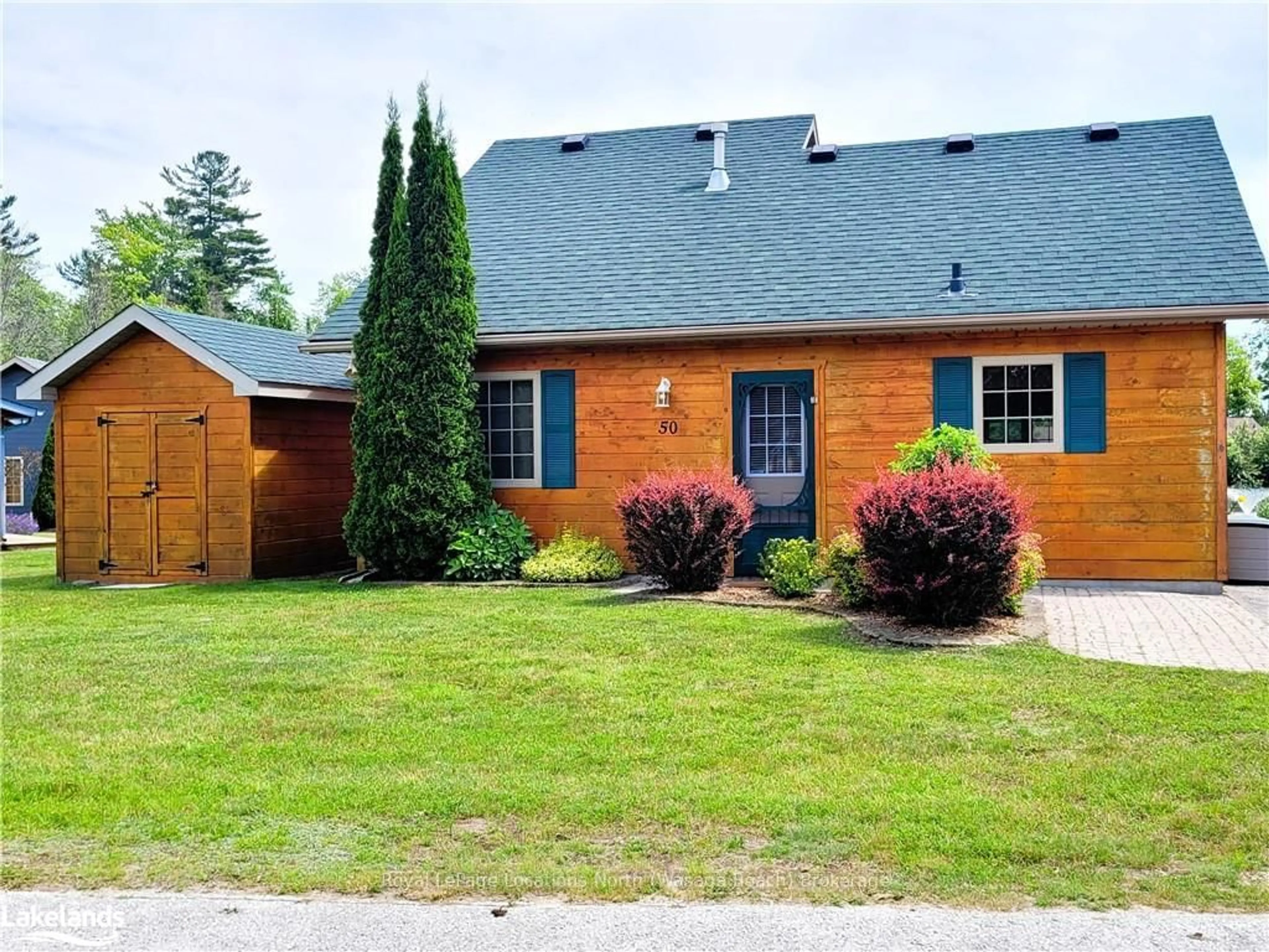Home with brick exterior material, street for 50 CABIN Cres, Wasaga Beach Ontario L9Z 1X7