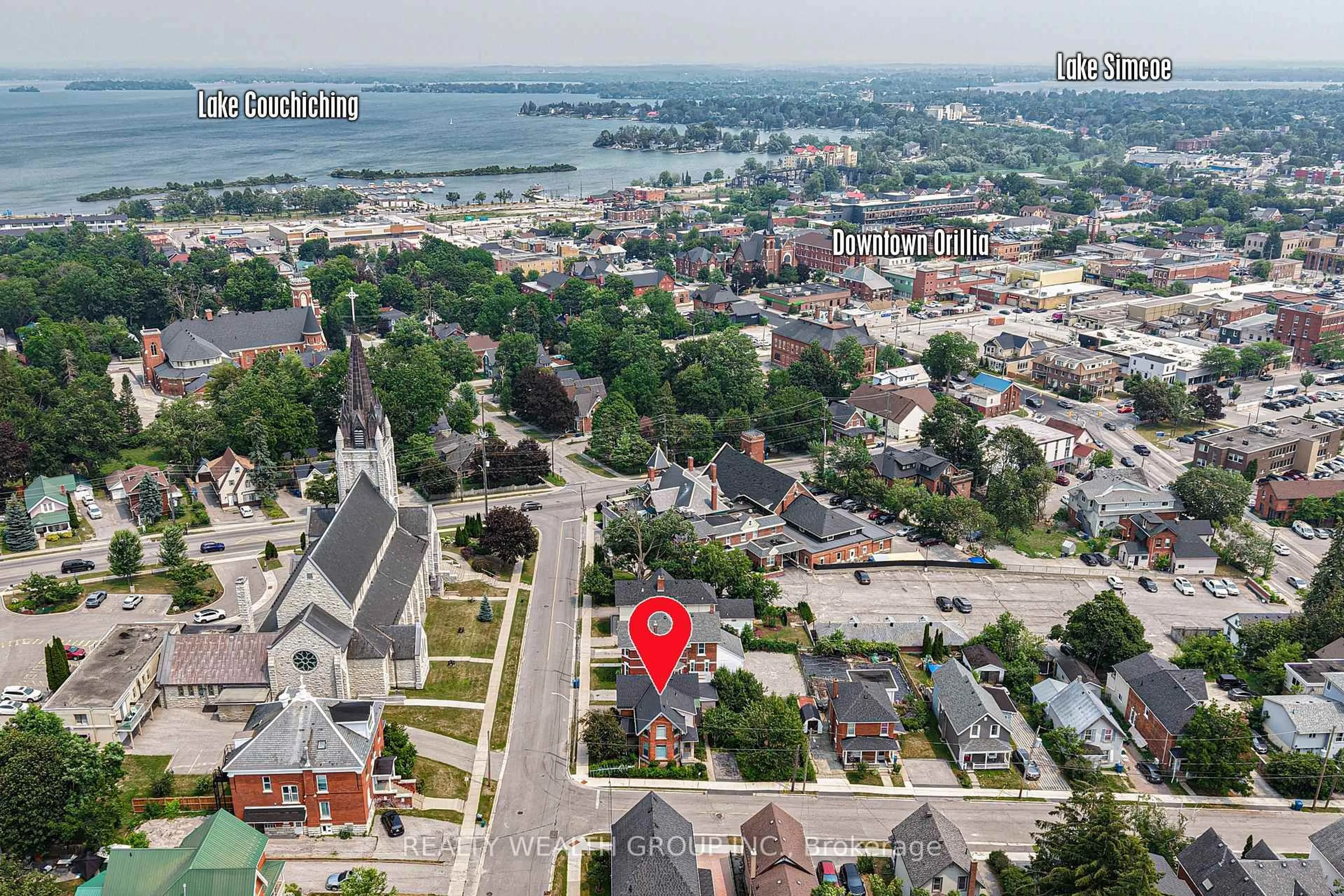 A pic from outside/outdoor area/front of a property/back of a property/a pic from drone, unknown for 23 Penetang St #2, Orillia Ontario L3V 3N1