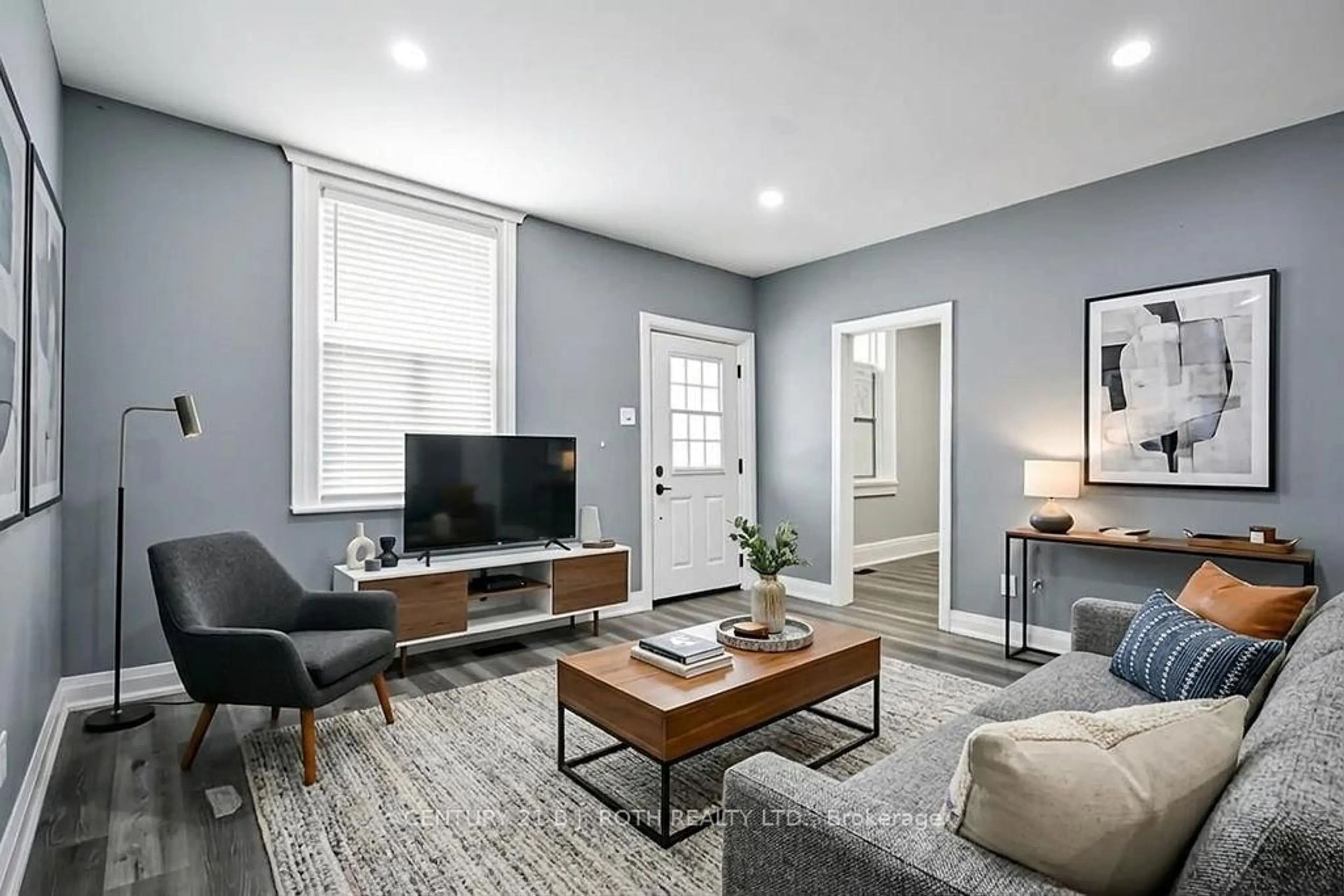 Living room with furniture, unknown for 44 Sanford St, Barrie Ontario L4N 3C4