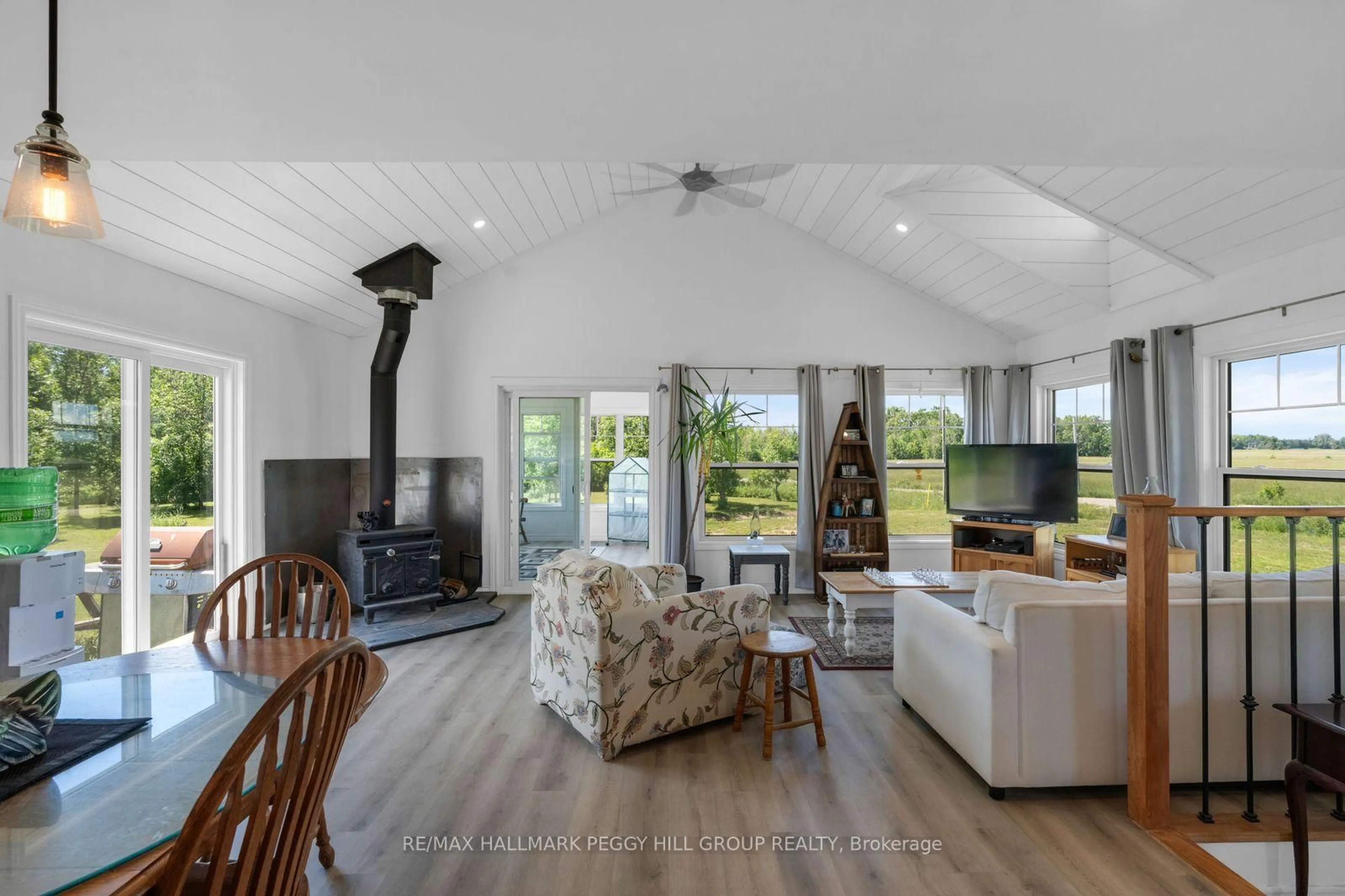Living room with furniture, wood/laminate floor for 2293 Hampshire Mills Line, Severn Ontario L3V 0Y5