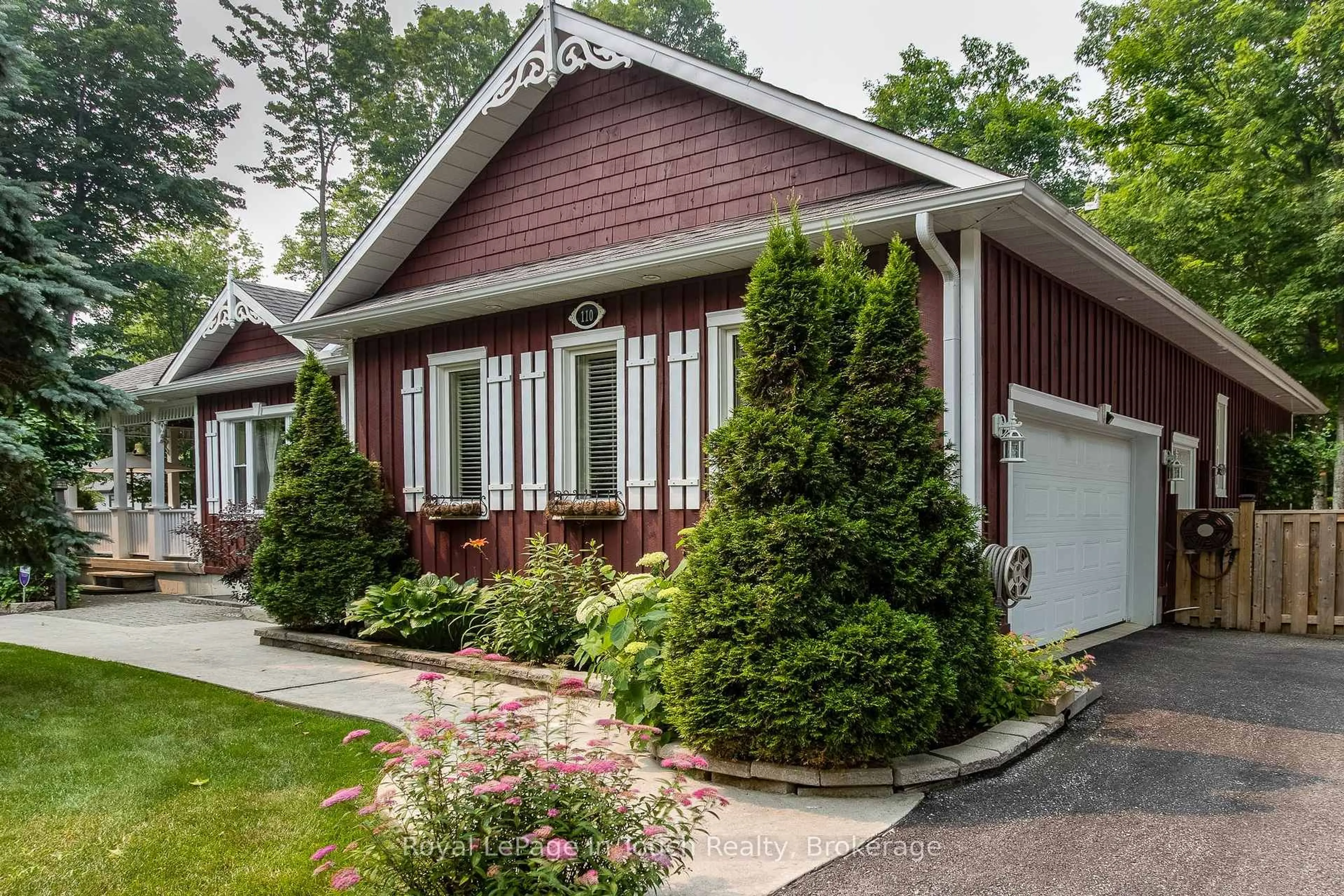 Home with vinyl exterior material, street for 110 Rue Jules Leger Rd, Tiny Ontario L9M 0J2