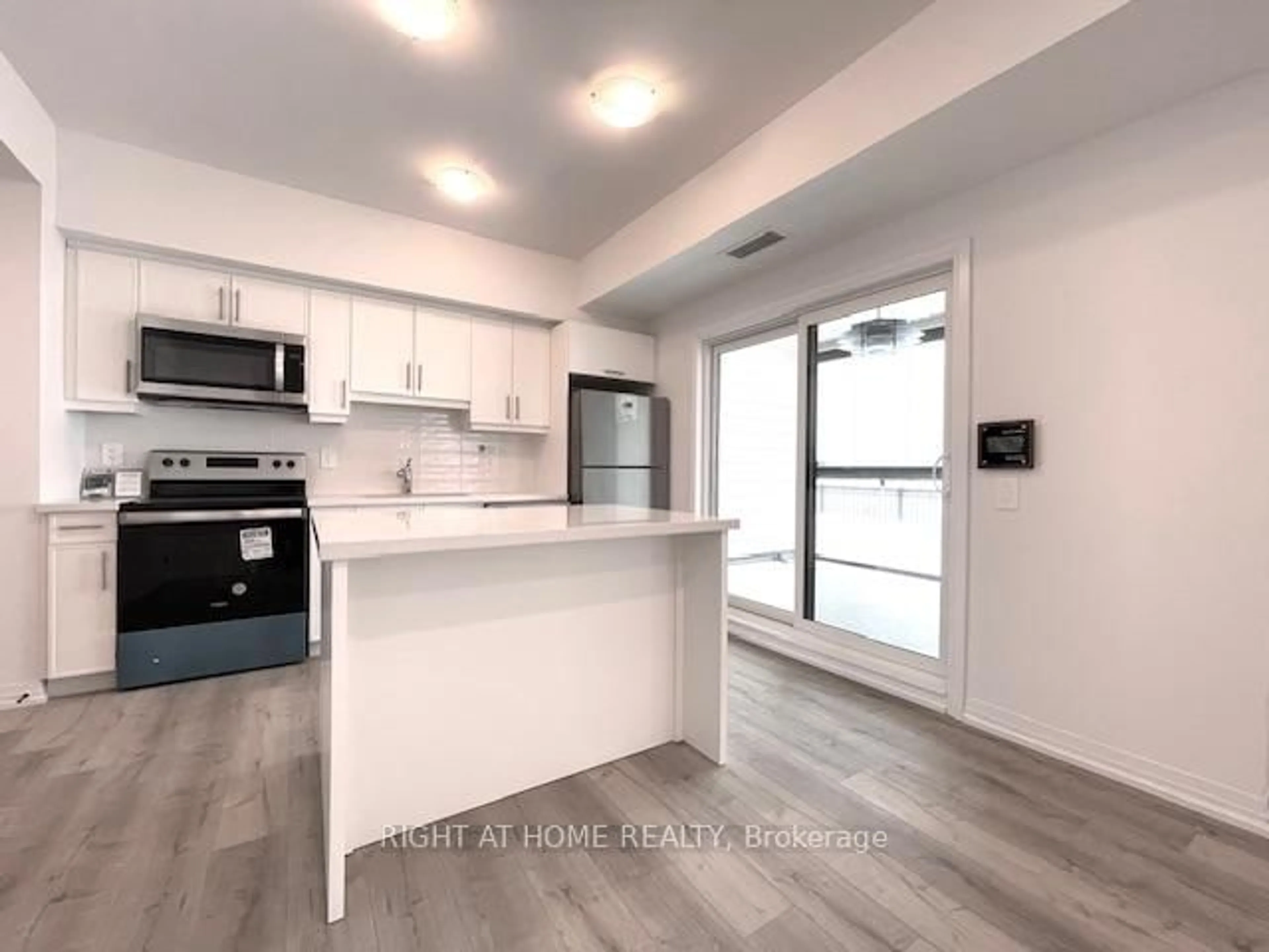 Open concept kitchen, unknown for 15 Kneeshaw Dr #102, Barrie Ontario L9J 0X9