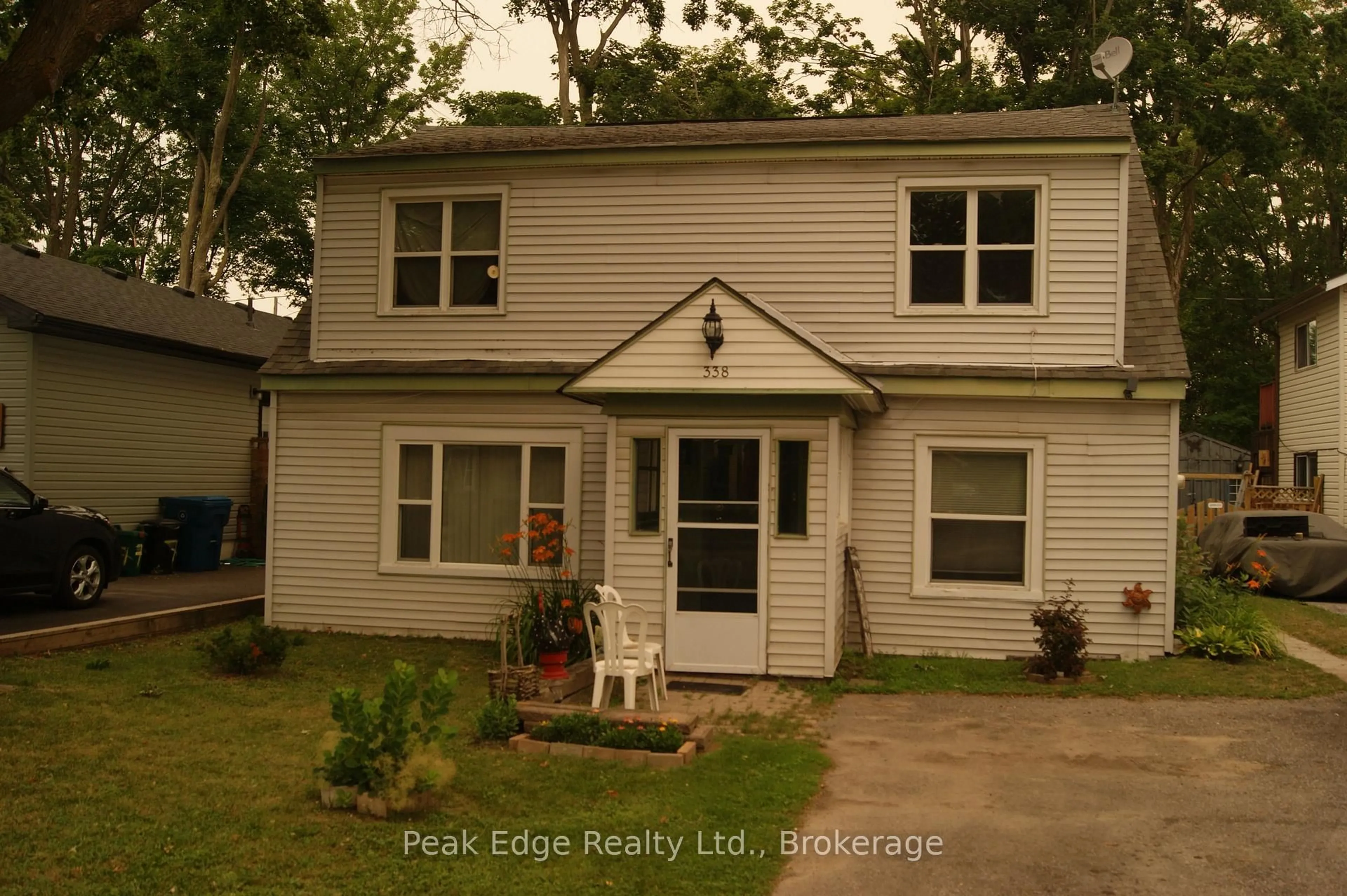 Home with vinyl exterior material, street for 338 Colborne St, Orillia Ontario L3V 3A3