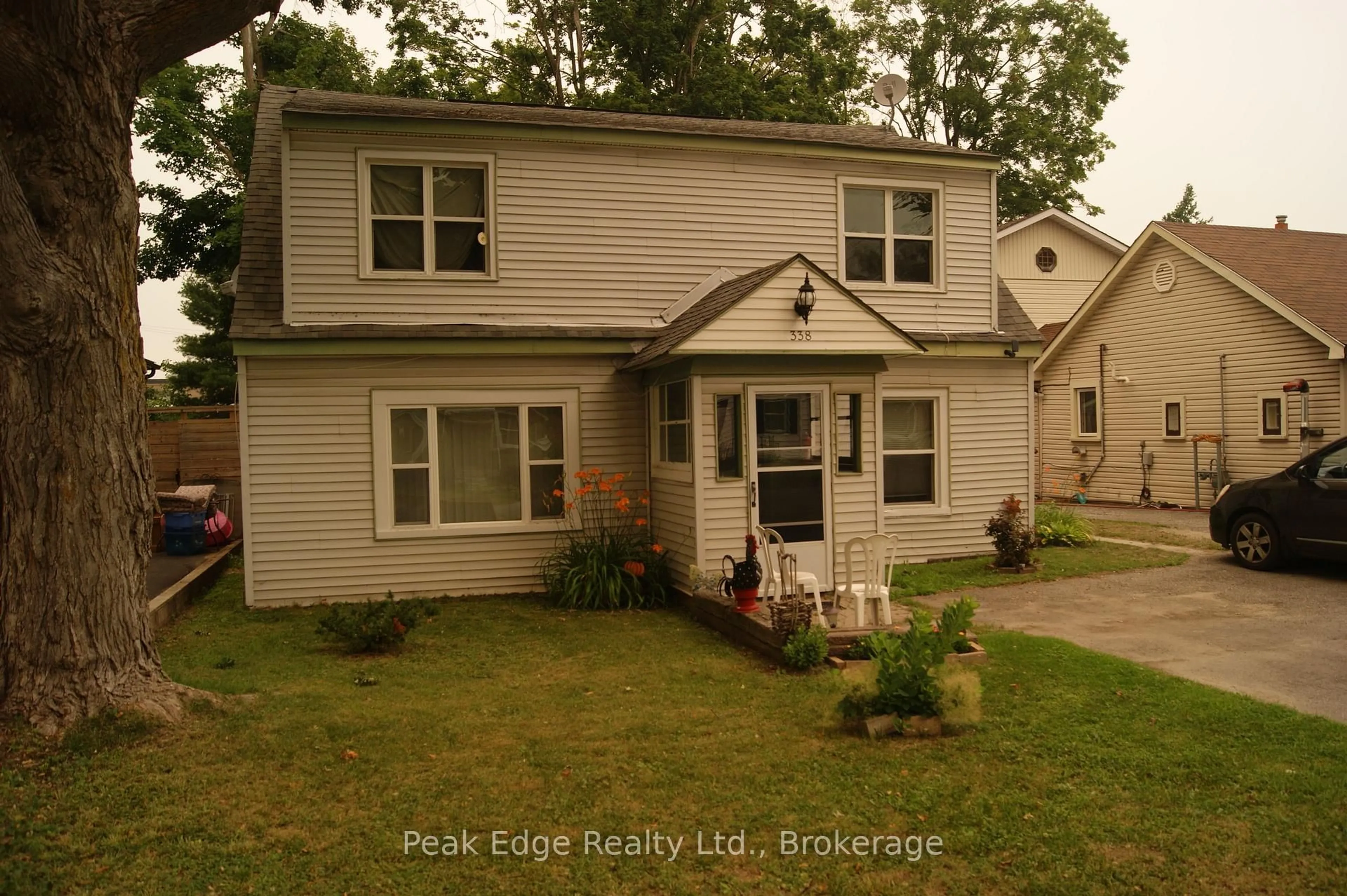 Home with vinyl exterior material, street for 338 Colborne St, Orillia Ontario L3V 3A3