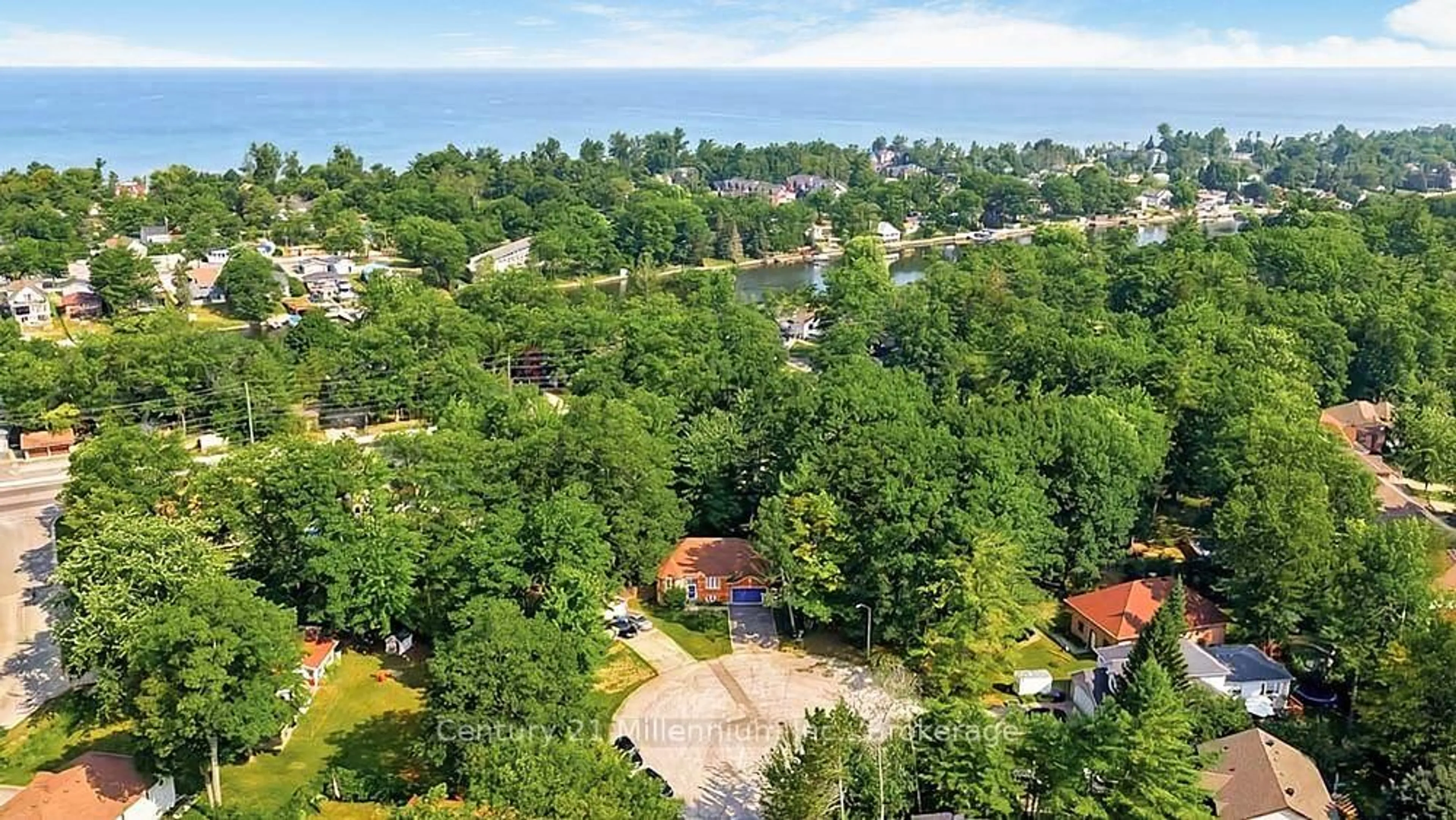 A pic from outside/outdoor area/front of a property/back of a property/a pic from drone, forest/trees view for 45 Fatima Crt, Wasaga Beach Ontario L9Z 1K9