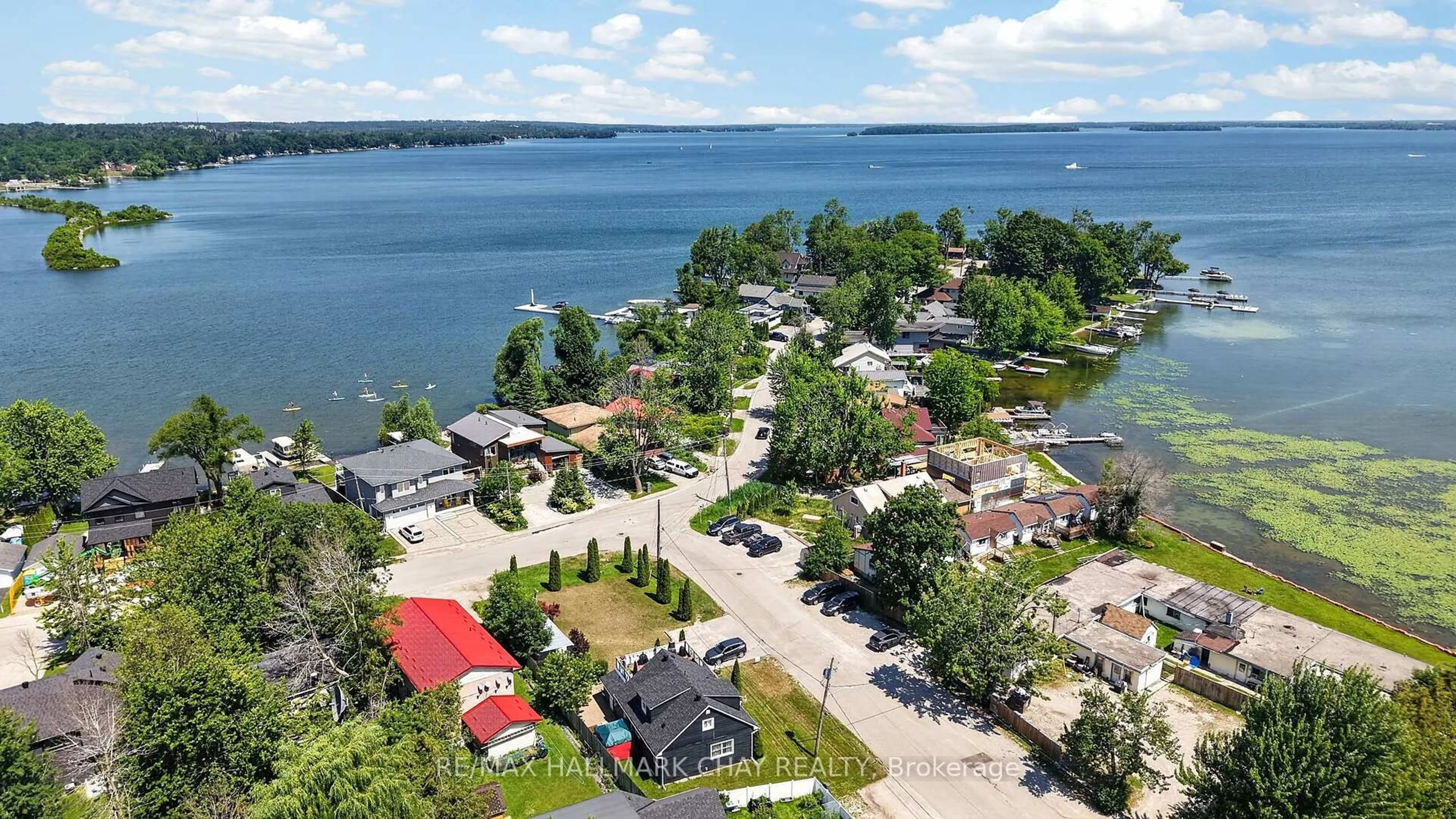 A pic from outside/outdoor area/front of a property/back of a property/a pic from drone, water/lake/river/ocean view for 165 Cedar Island Rd, Orillia Ontario L3V 1S9