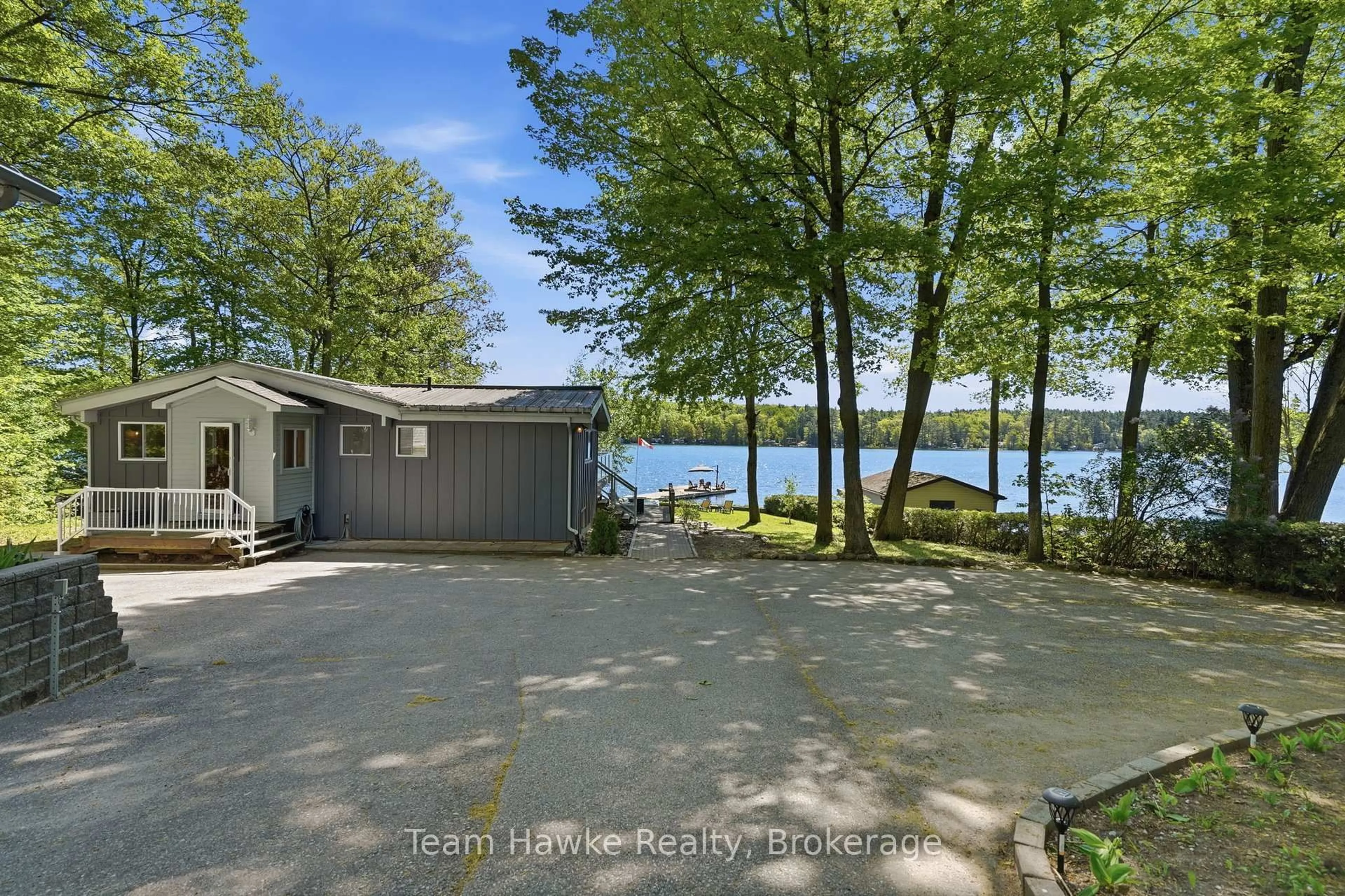 A pic from outside/outdoor area/front of a property/back of a property/a pic from drone, water/lake/river/ocean view for 23 Timcourt Dr, Tiny Ontario L9M 0B9