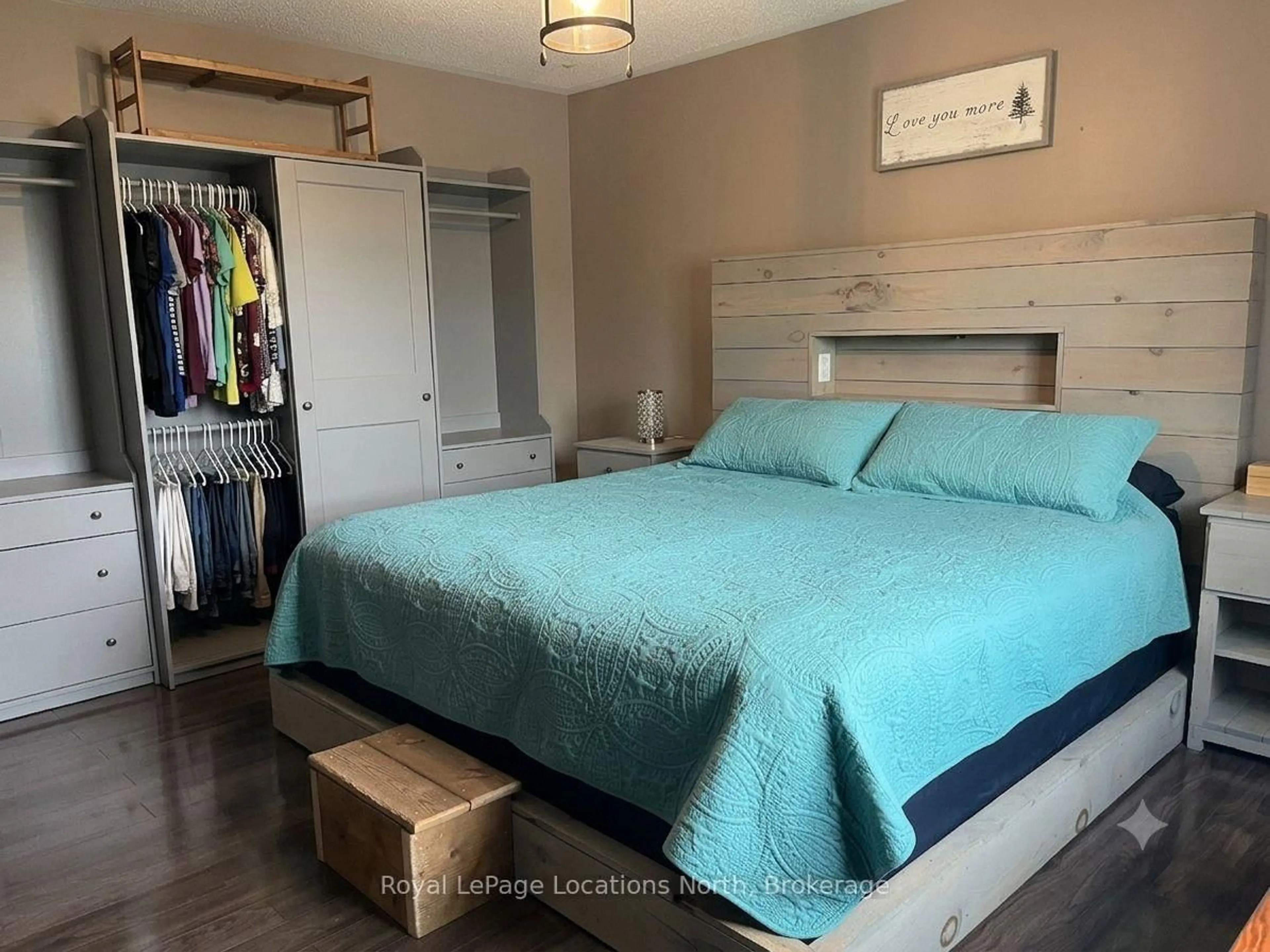 Bedroom with bed, wood/laminate floor for 239 Atkinson St, Clearview Ontario L0M 1S0