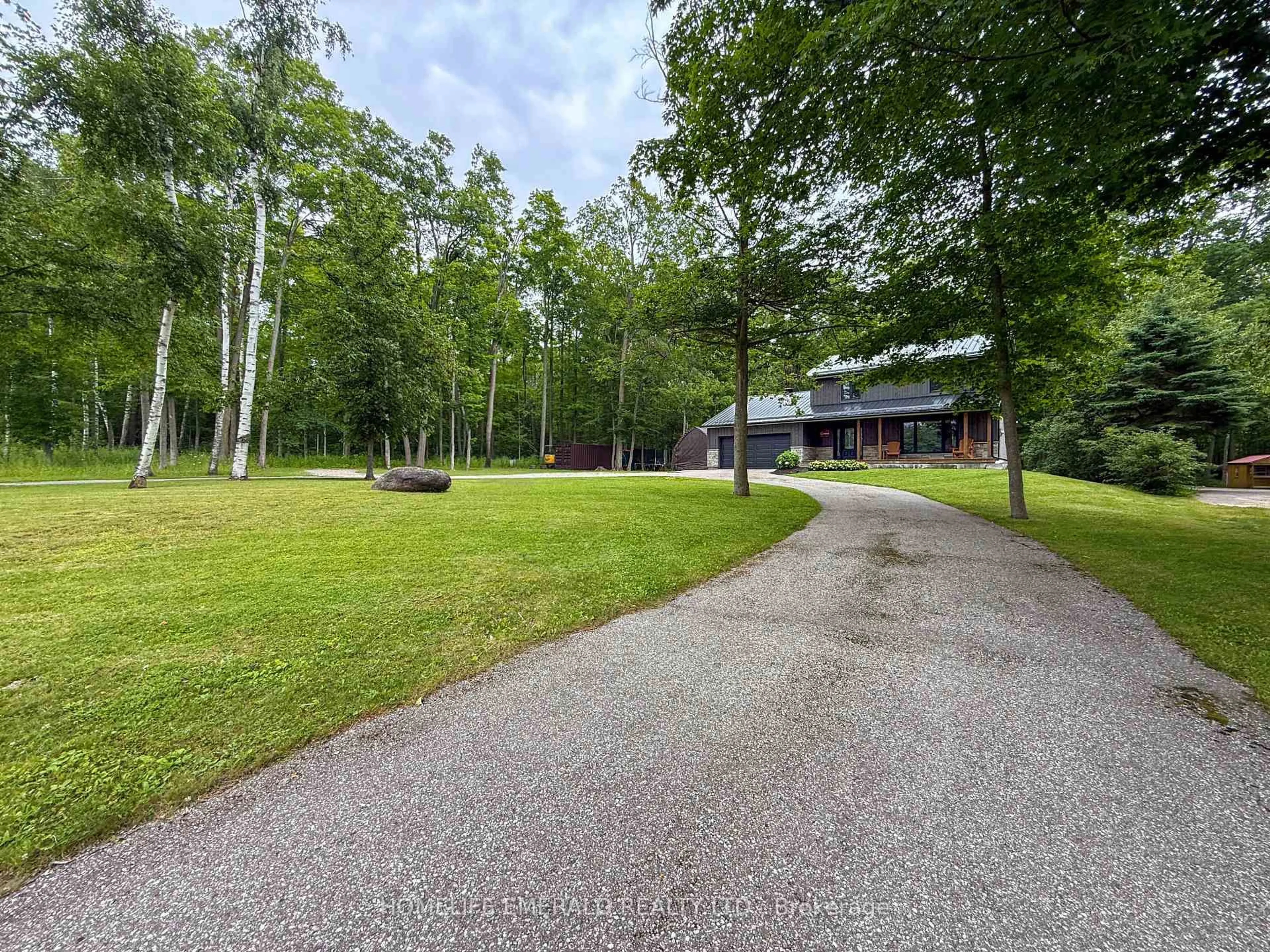 A pic from outside/outdoor area/front of a property/back of a property/a pic from drone, forest/trees view for 2391 Seadon Rd, Springwater Ontario L4N 6V1
