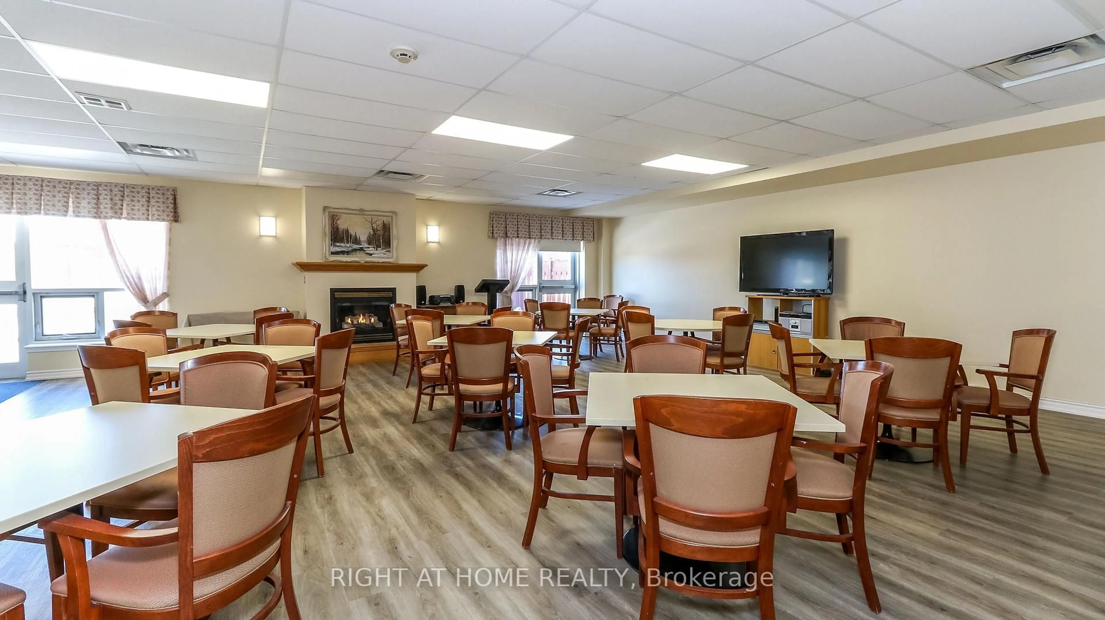 Dining room, wood/laminate floor for 94 Dean Ave #404, Barrie Ontario L4N 0M3