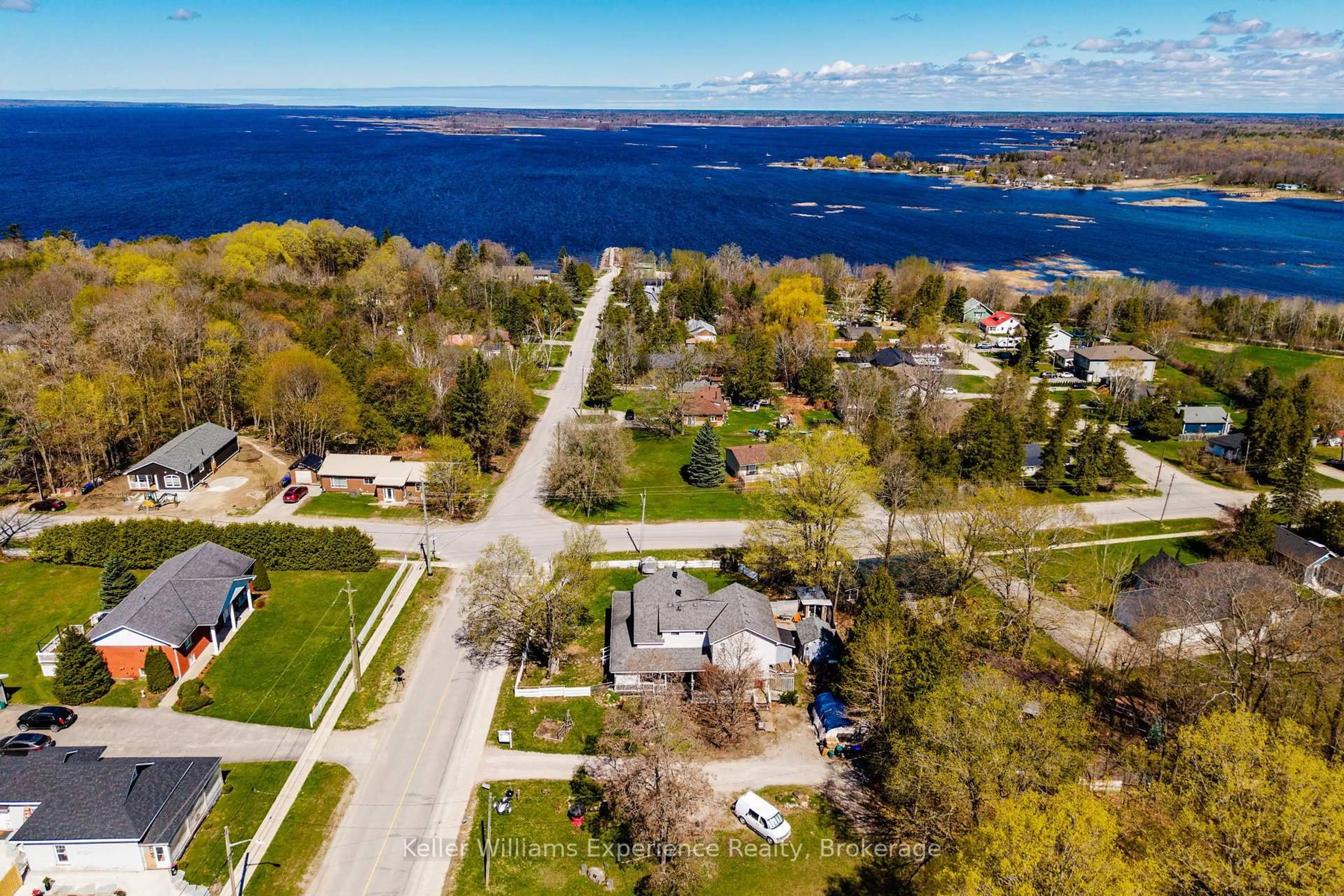 A pic from outside/outdoor area/front of a property/back of a property/a pic from drone, water/lake/river/ocean view for 107 Pine St, Tay Ontario L0K 2C0