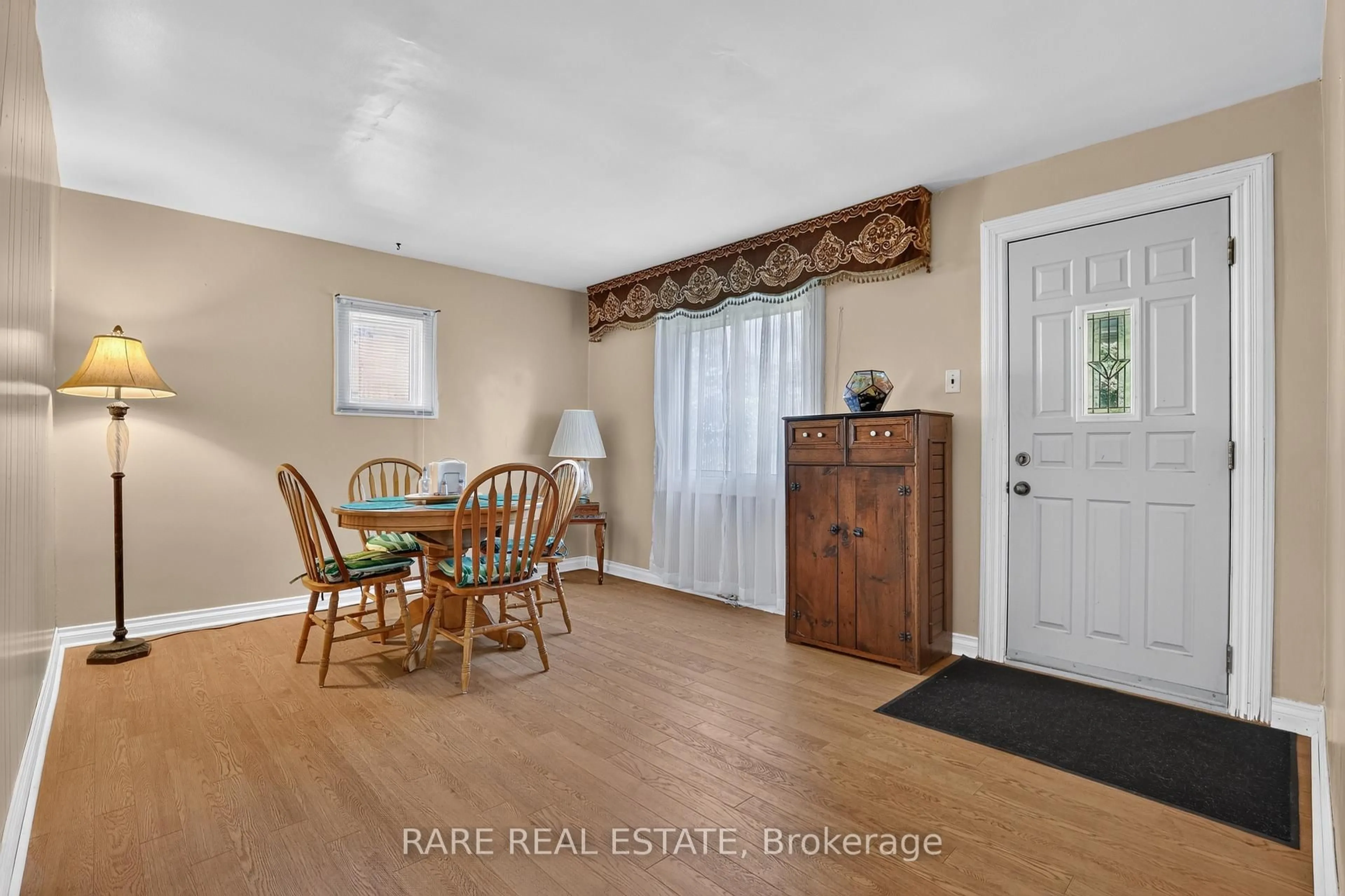 Dining room, wood/laminate floor for 11 Wood St, Barrie Ontario L4N 2S9