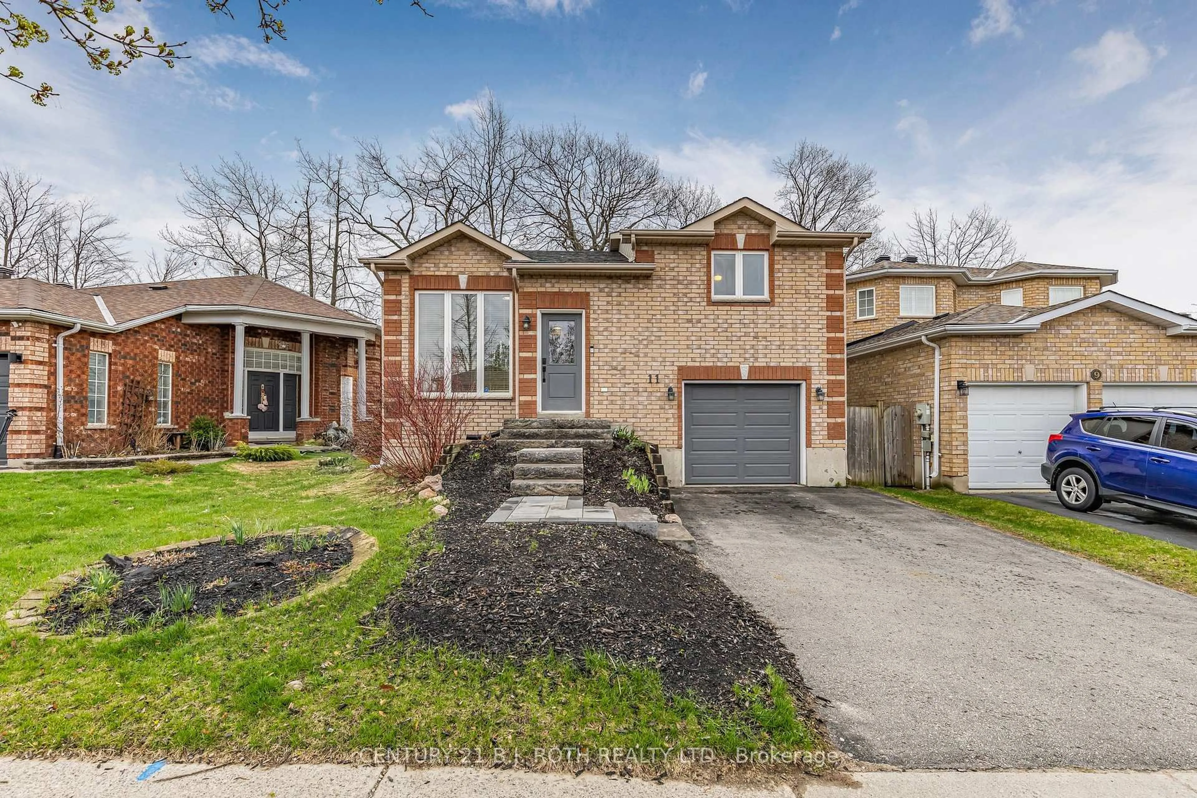 Home with brick exterior material, street for 11 Masters Dr, Barrie Ontario L4M 6W4