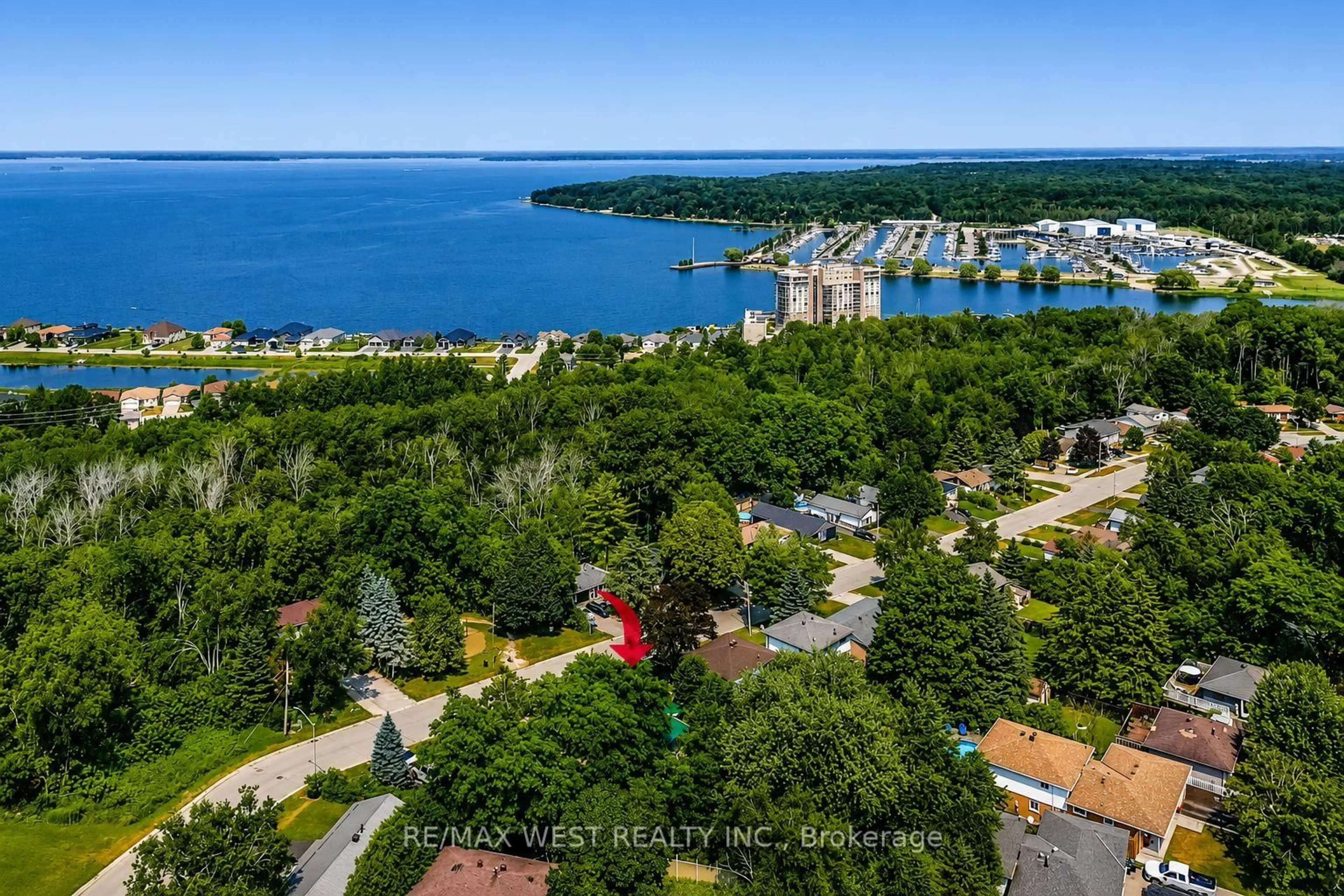 A pic from outside/outdoor area/front of a property/back of a property/a pic from drone, water/lake/river/ocean view for 747 Birchwood Dr, Midland Ontario L4R 2P8