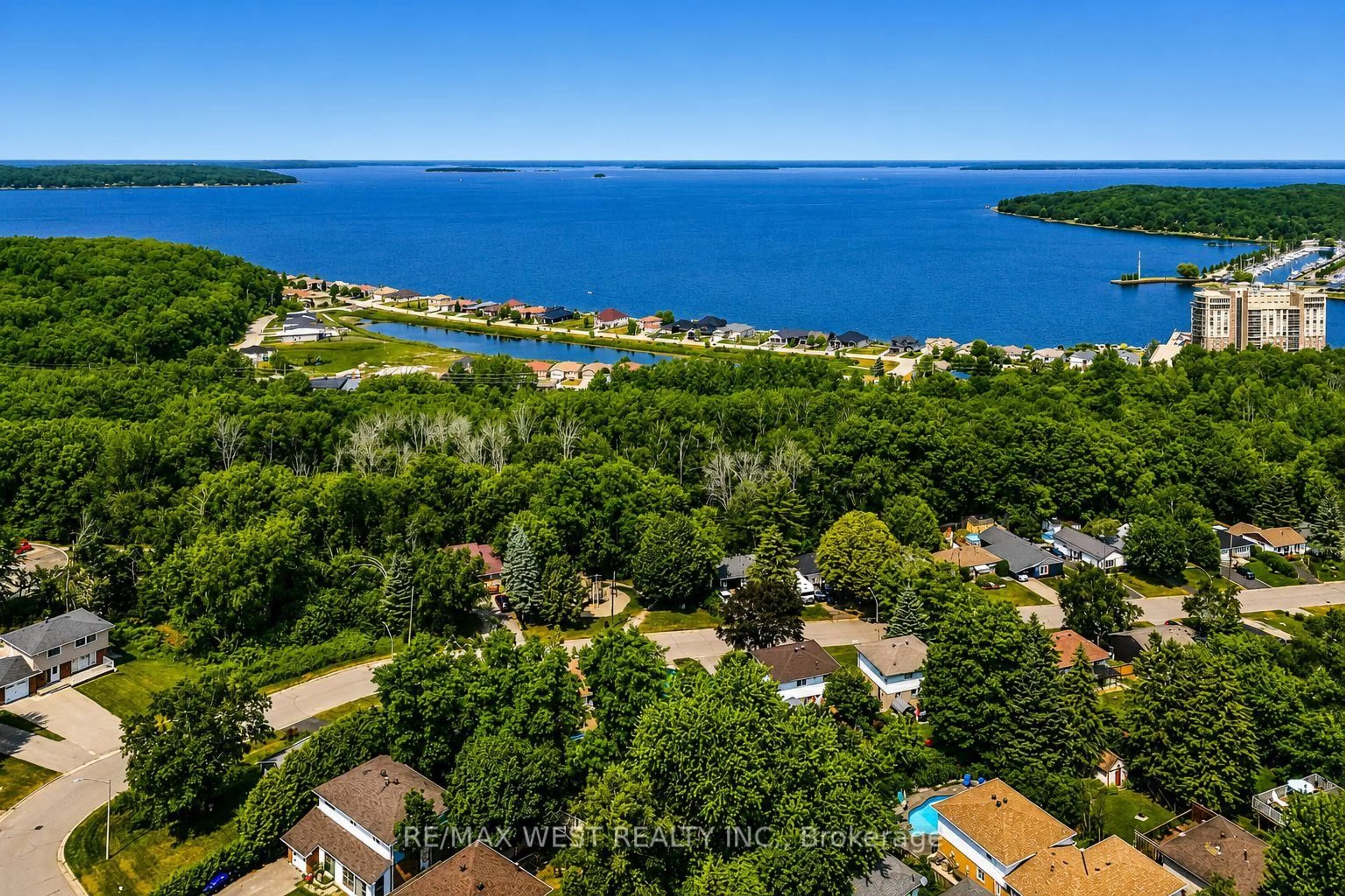 A pic from outside/outdoor area/front of a property/back of a property/a pic from drone, water/lake/river/ocean view for 747 Birchwood Dr, Midland Ontario L4R 2P8