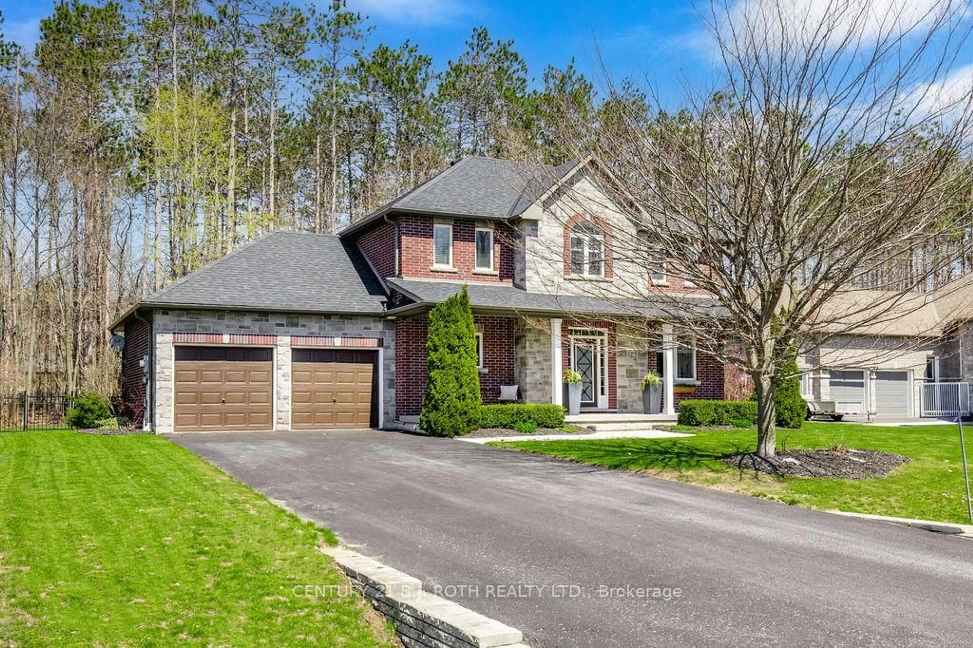 Home with brick exterior material, street for 12 Lloyd Cook Dr, Springwater Ontario L0L 1Y3