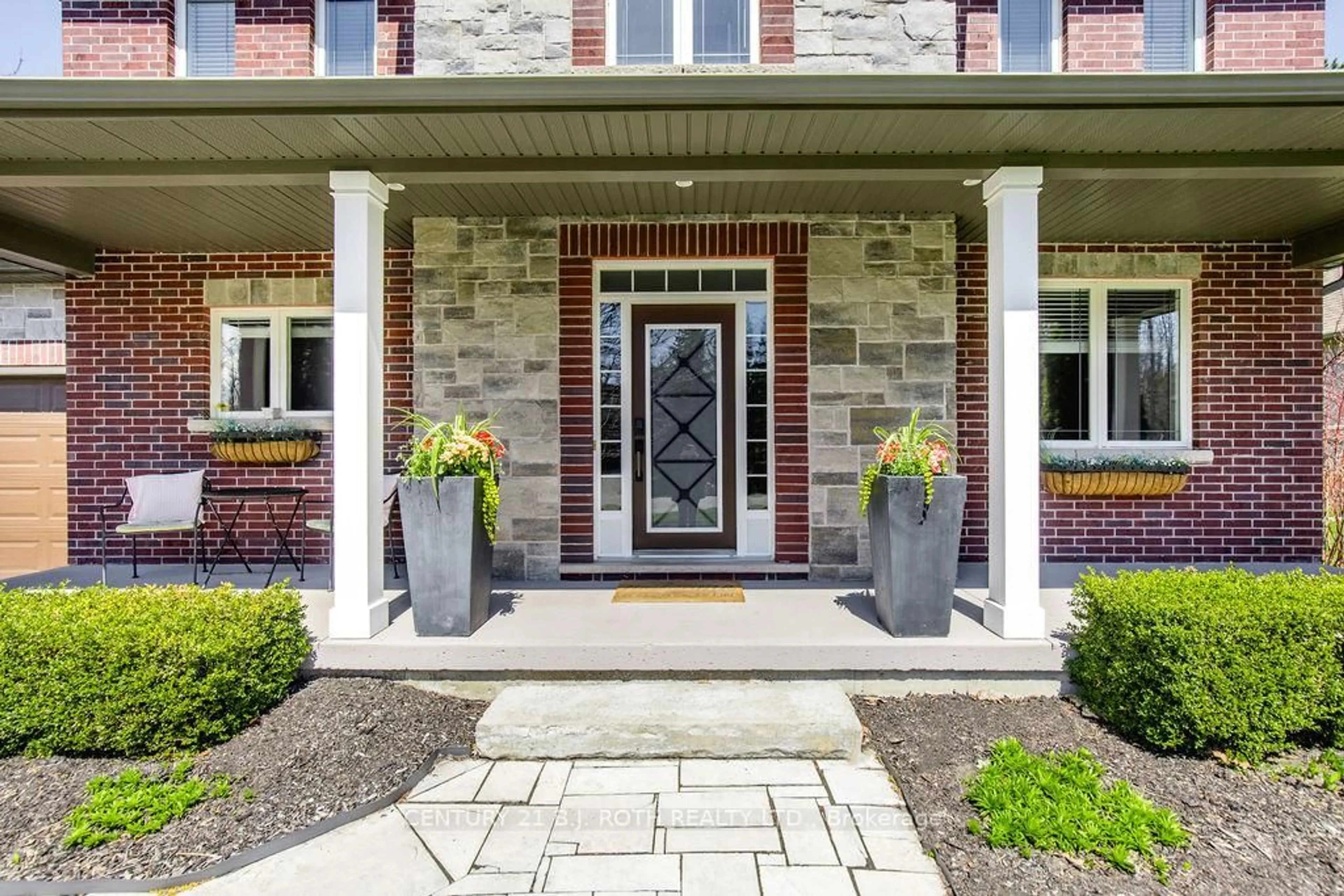 Home with brick exterior material, street for 12 Lloyd Cook Dr, Springwater Ontario L0L 1Y3