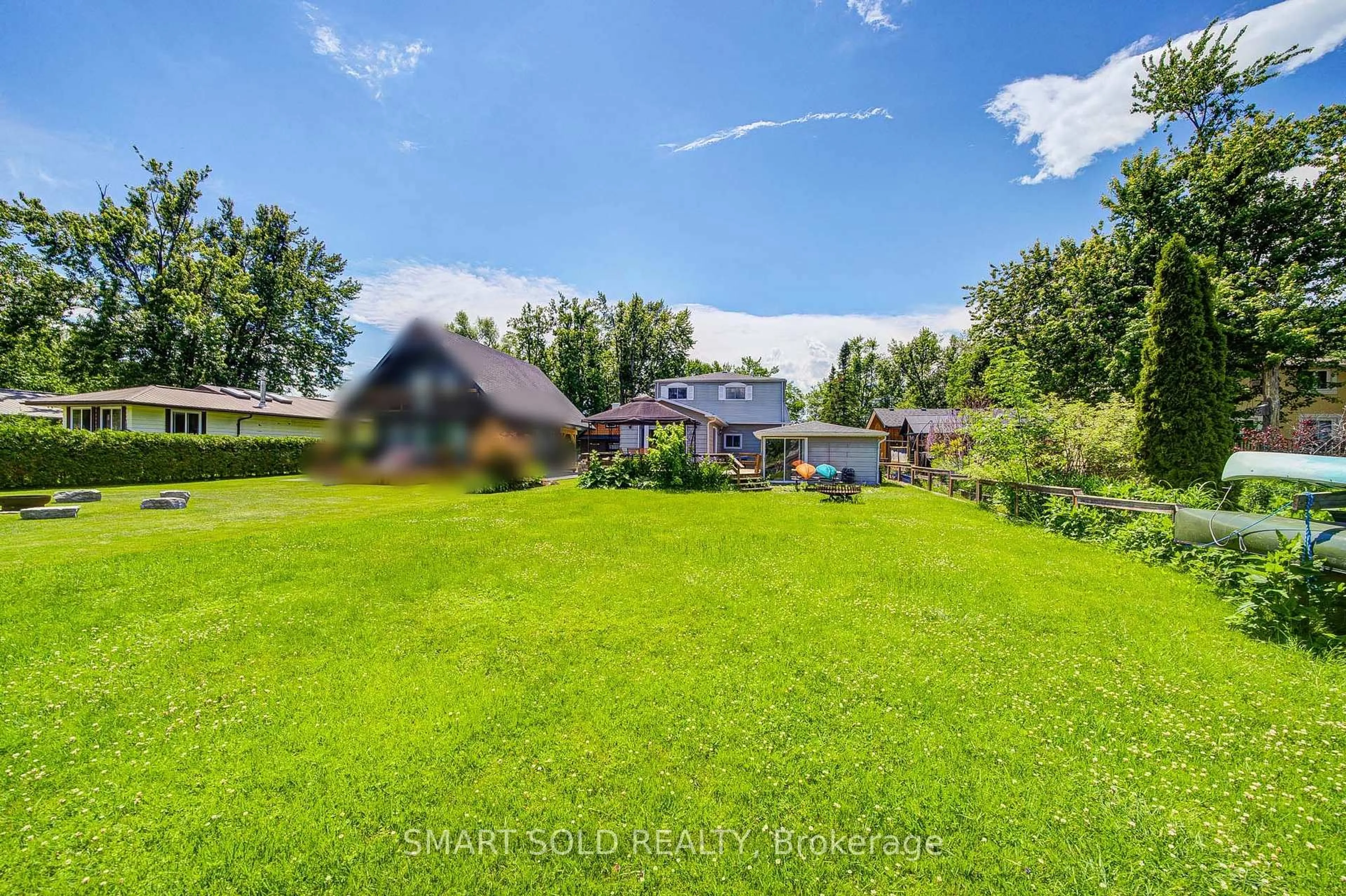 A pic from outside/outdoor area/front of a property/back of a property/a pic from drone, water/lake/river/ocean view for 75 Lake Ave, Ramara Ontario L0K 1B0