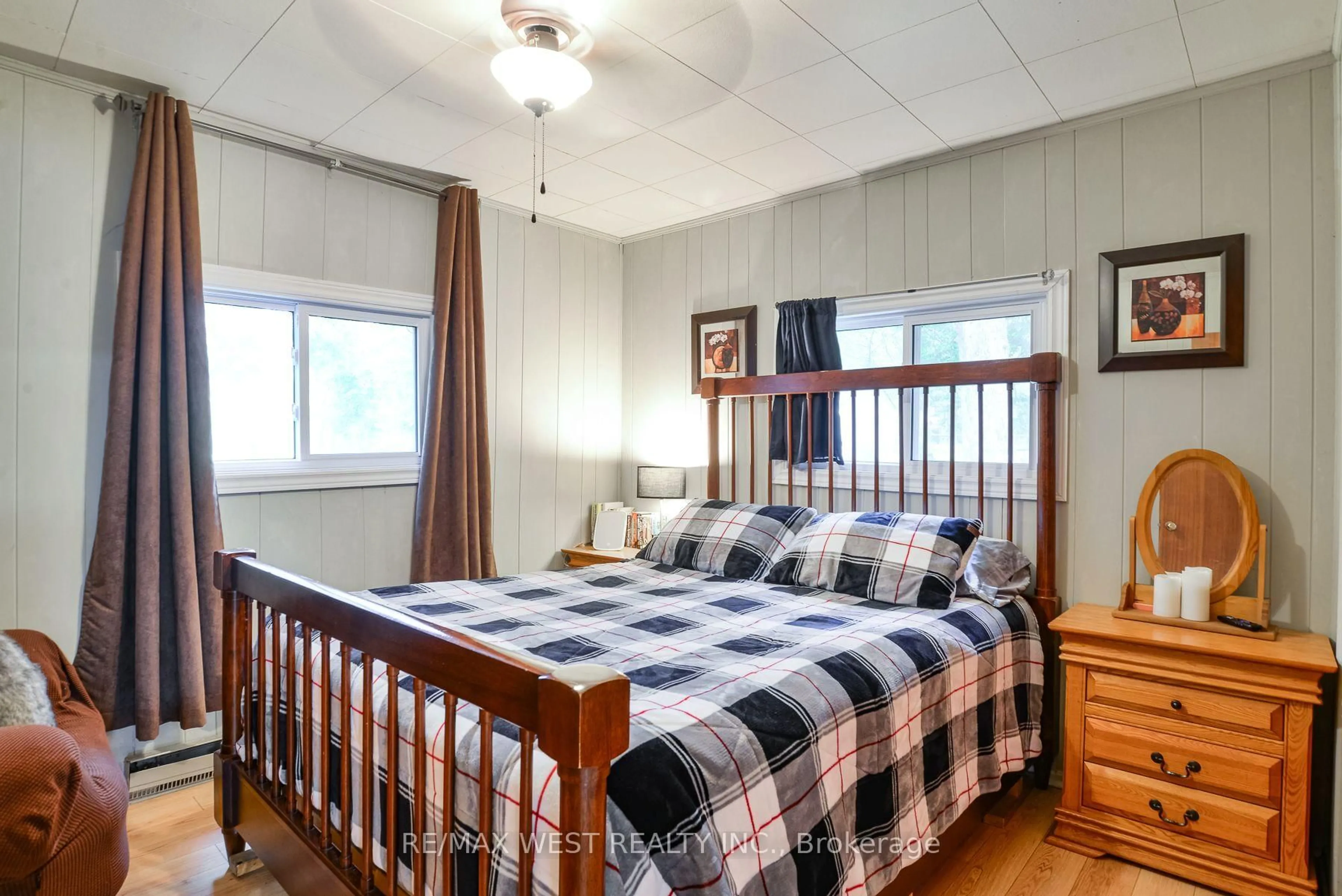Bedroom with bed, wood/laminate floor for 1072 Sylvan Glen Dr, Ramara Ontario L0K 1B0