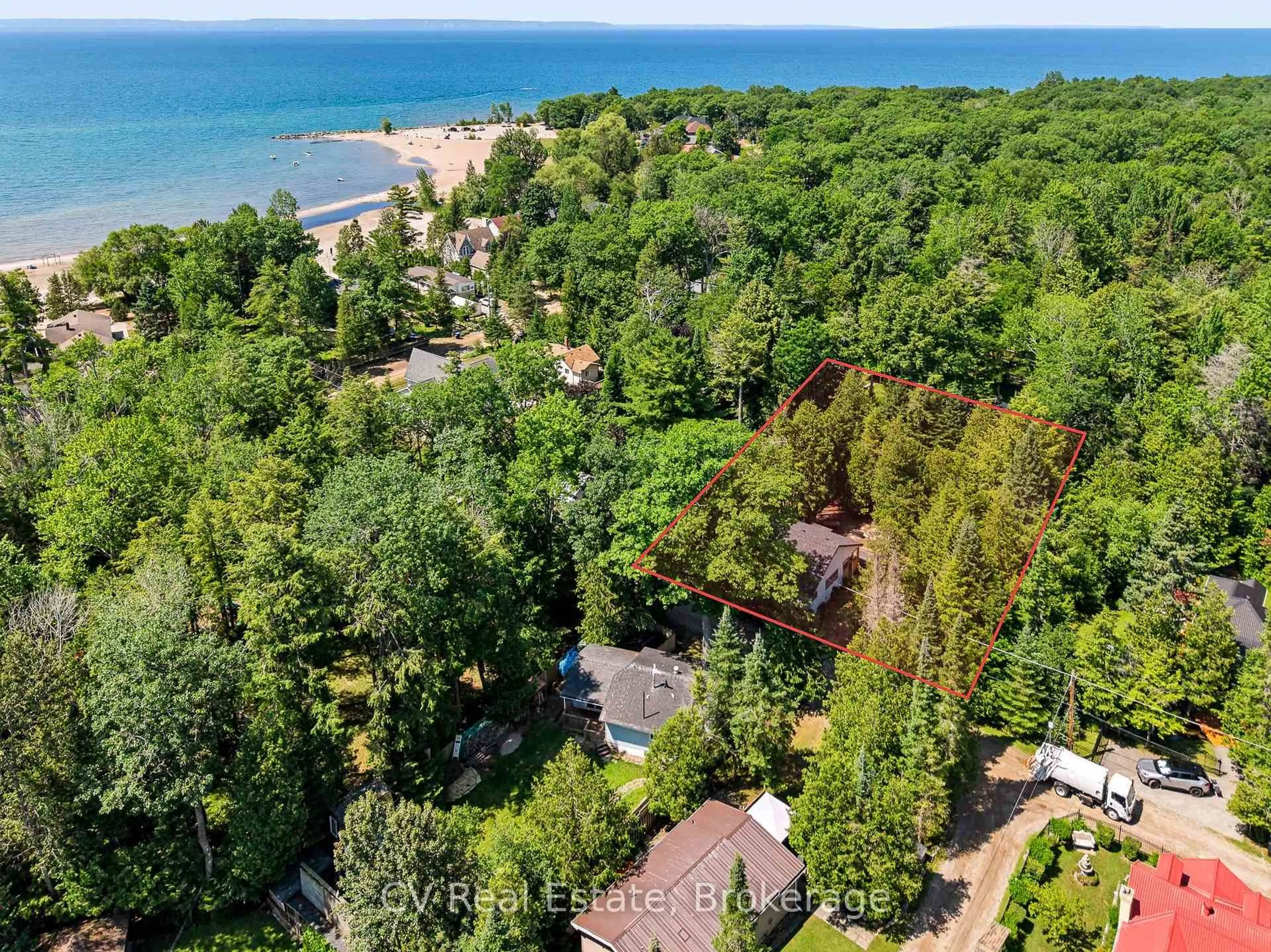 A pic from outside/outdoor area/front of a property/back of a property/a pic from drone, water/lake/river/ocean view for 10 Brookside Dr, Tiny Ontario L0L 2J0
