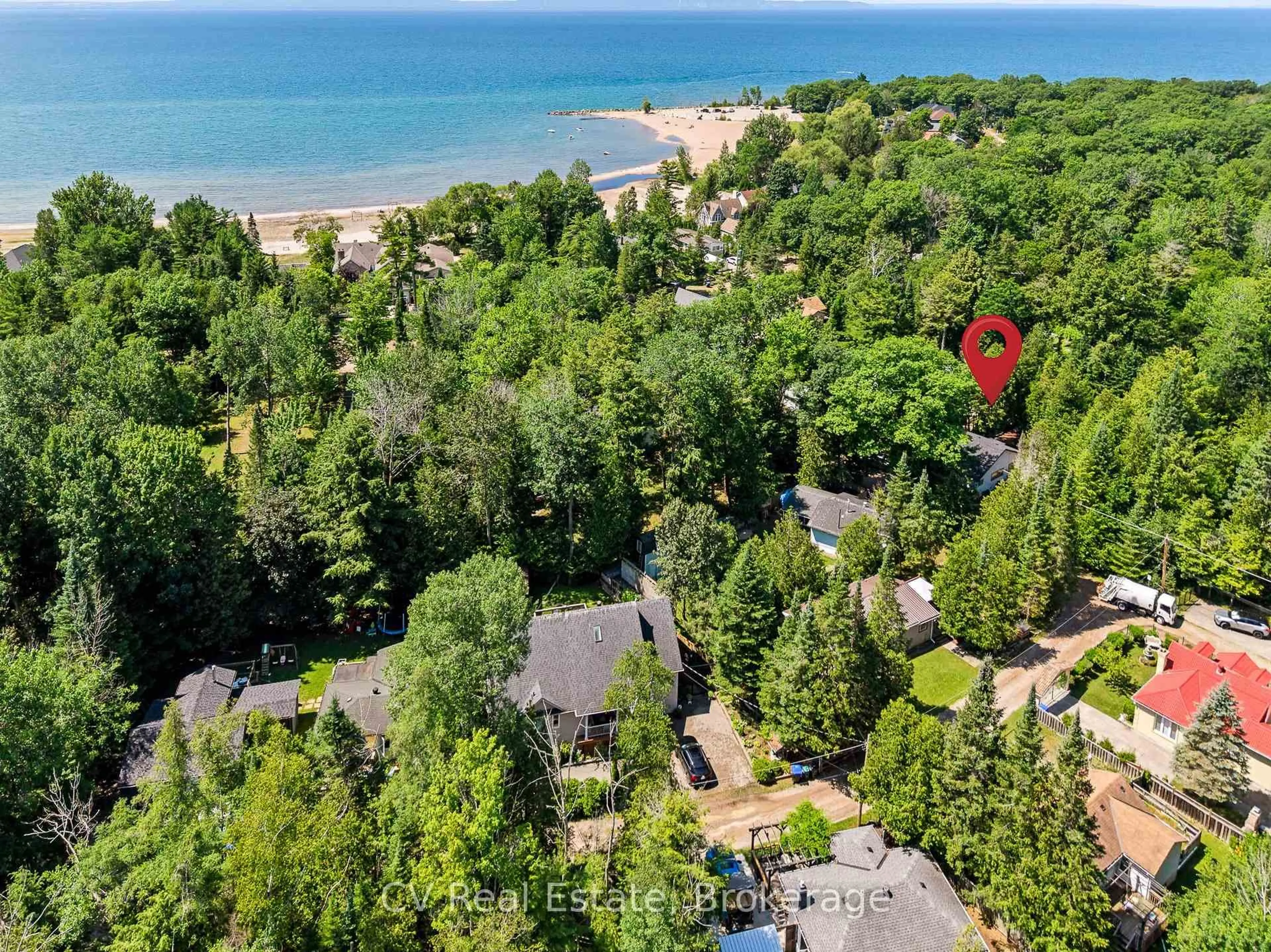 A pic from outside/outdoor area/front of a property/back of a property/a pic from drone, water/lake/river/ocean view for 10 Brookside Dr, Tiny Ontario L0L 2J0