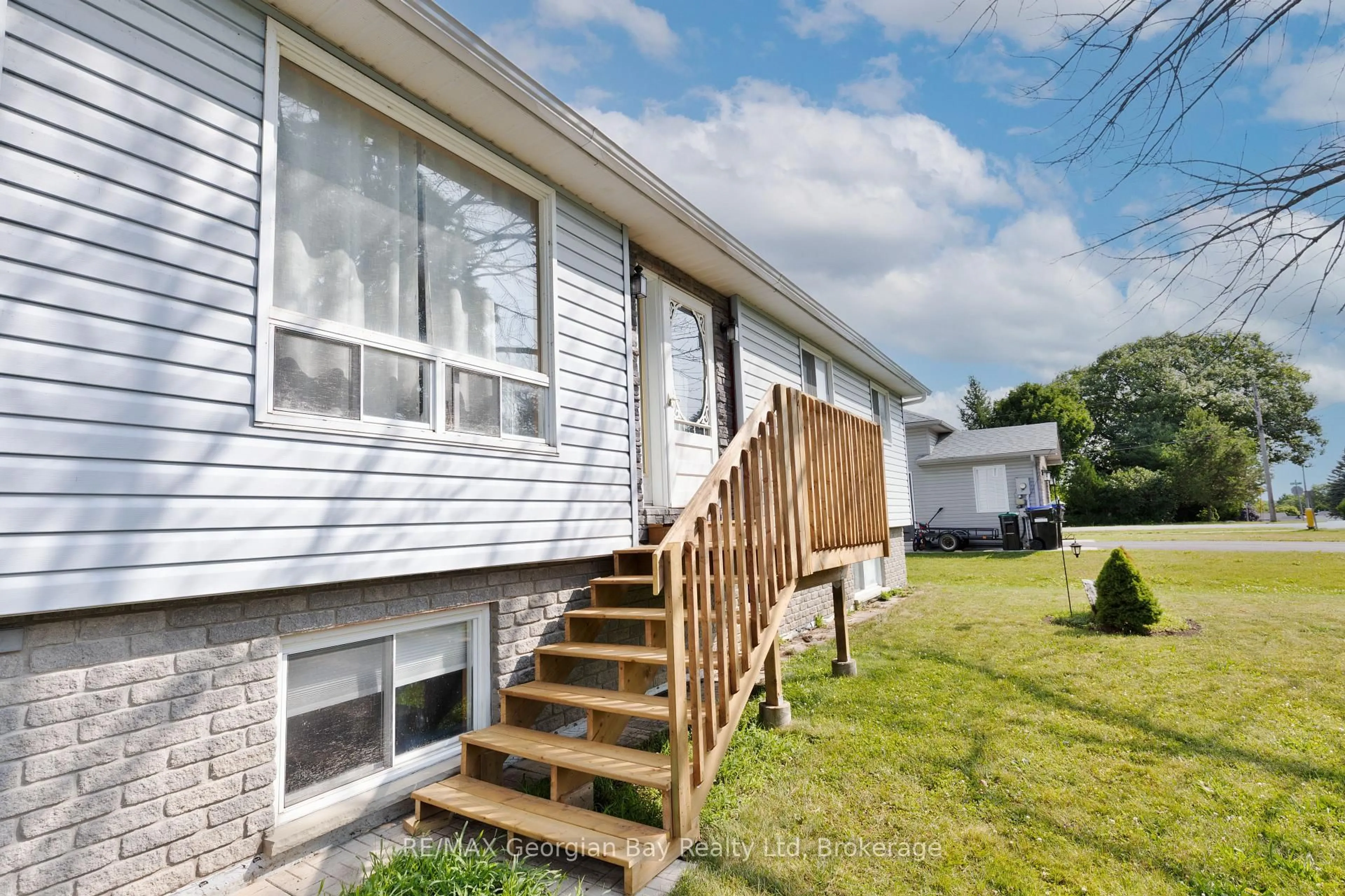 Home with vinyl exterior material, street for 144 George St, Tay Ontario L0K 2A0