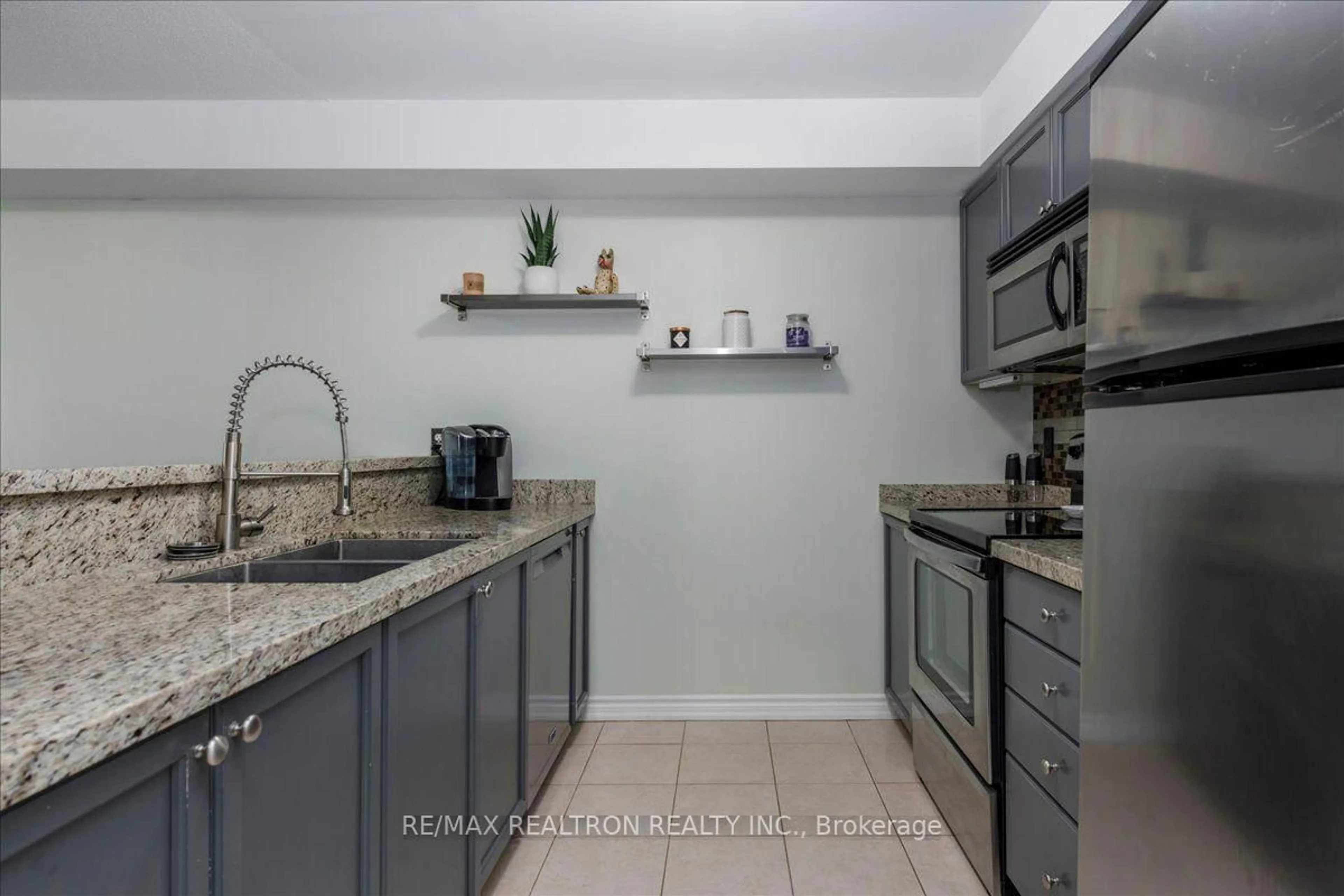 Open concept kitchen, ceramic/tile floor for 43 Coulter St #3, Barrie Ontario L4N 6L9