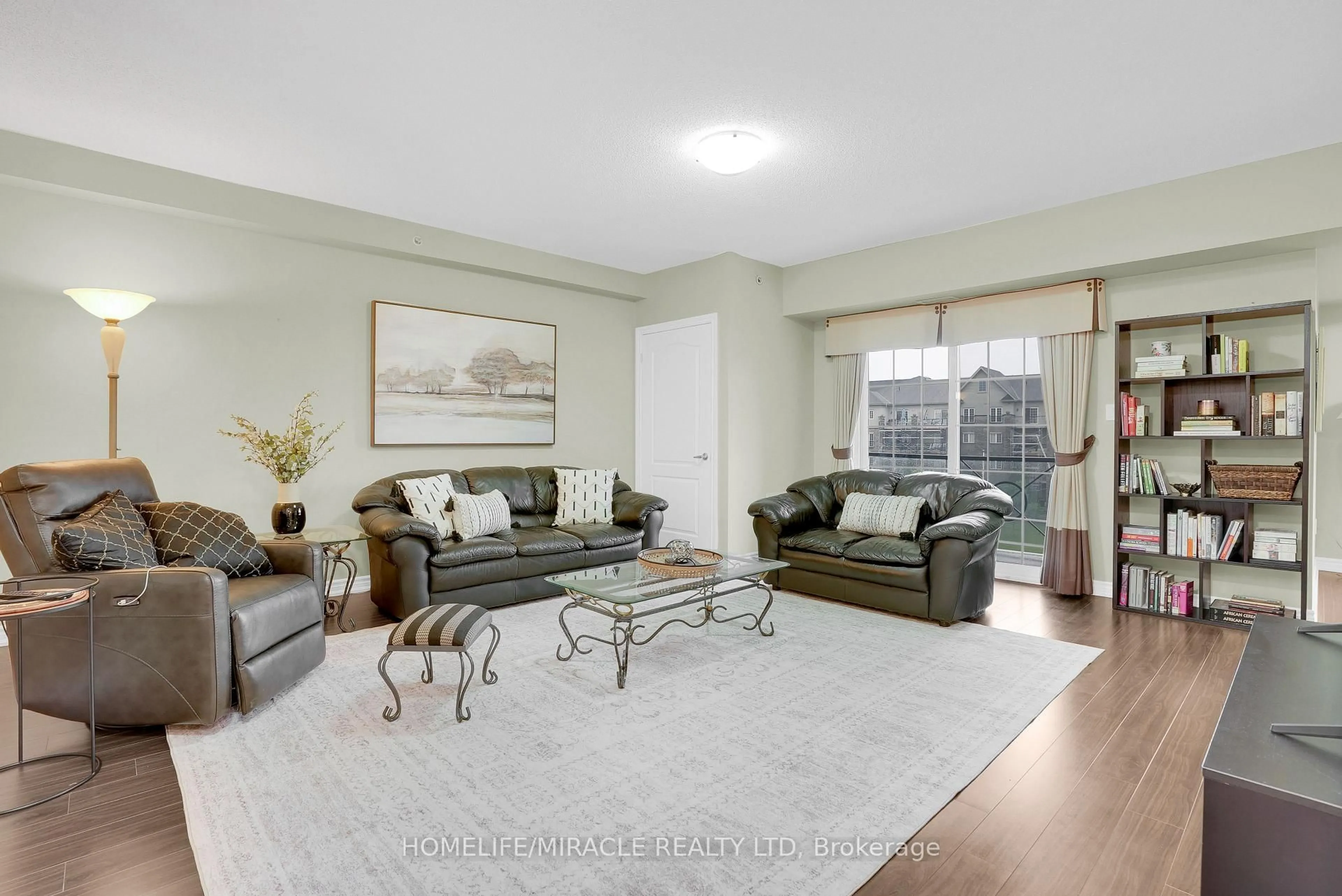 Living room with furniture, unknown for 39 Ferndale Dr #312, Barrie Ontario L4N 5T5