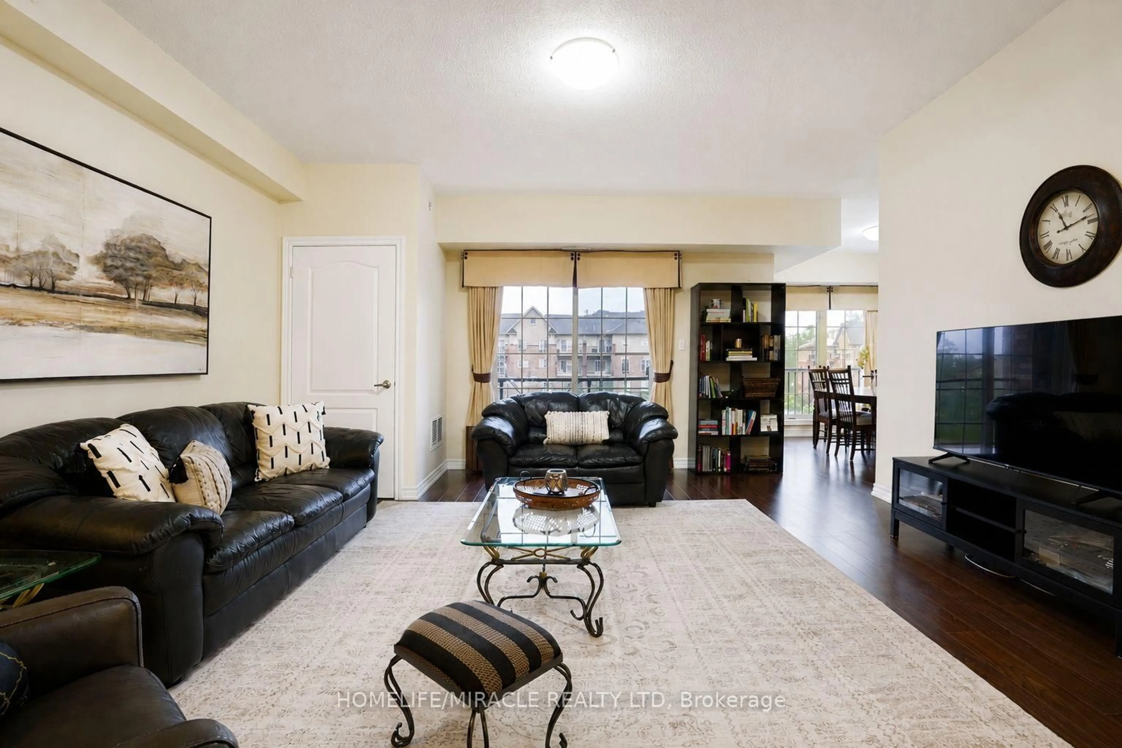 Living room with furniture, unknown for 39 Ferndale Dr #312, Barrie Ontario L4N 5T5