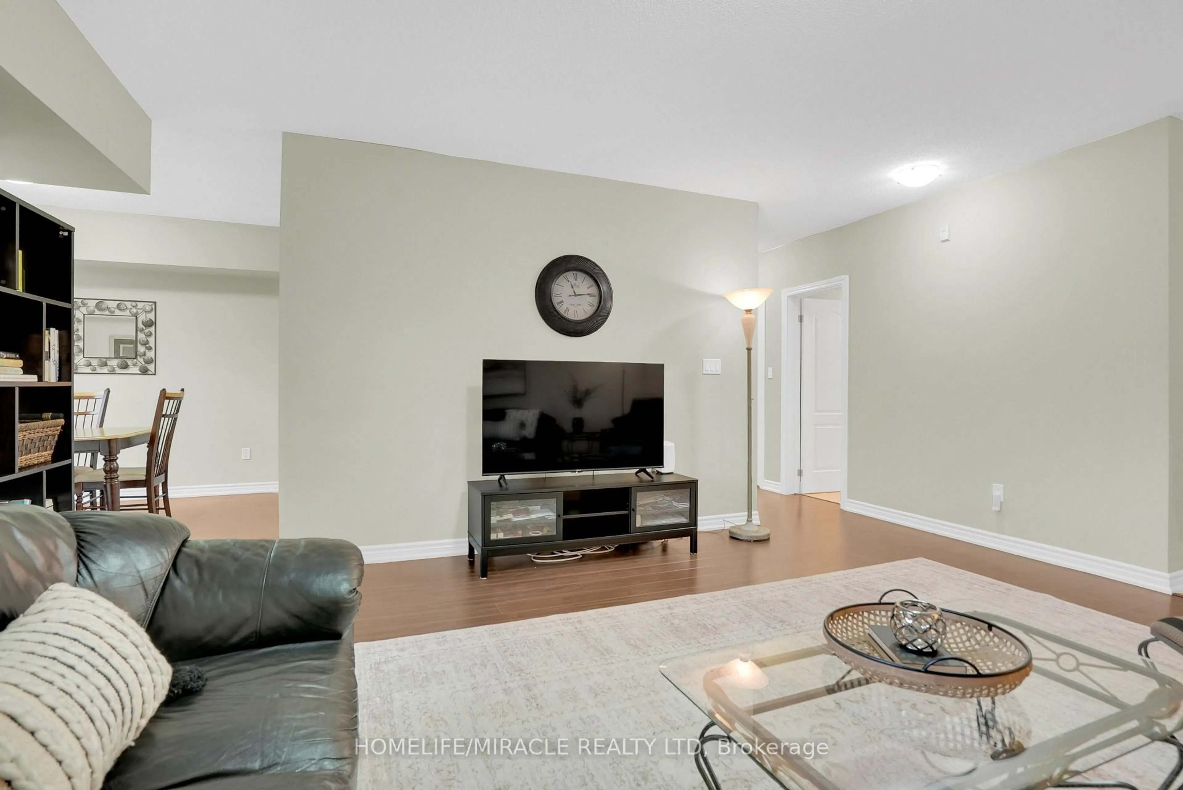 Living room with furniture, unknown for 39 Ferndale Dr #312, Barrie Ontario L4N 5T5