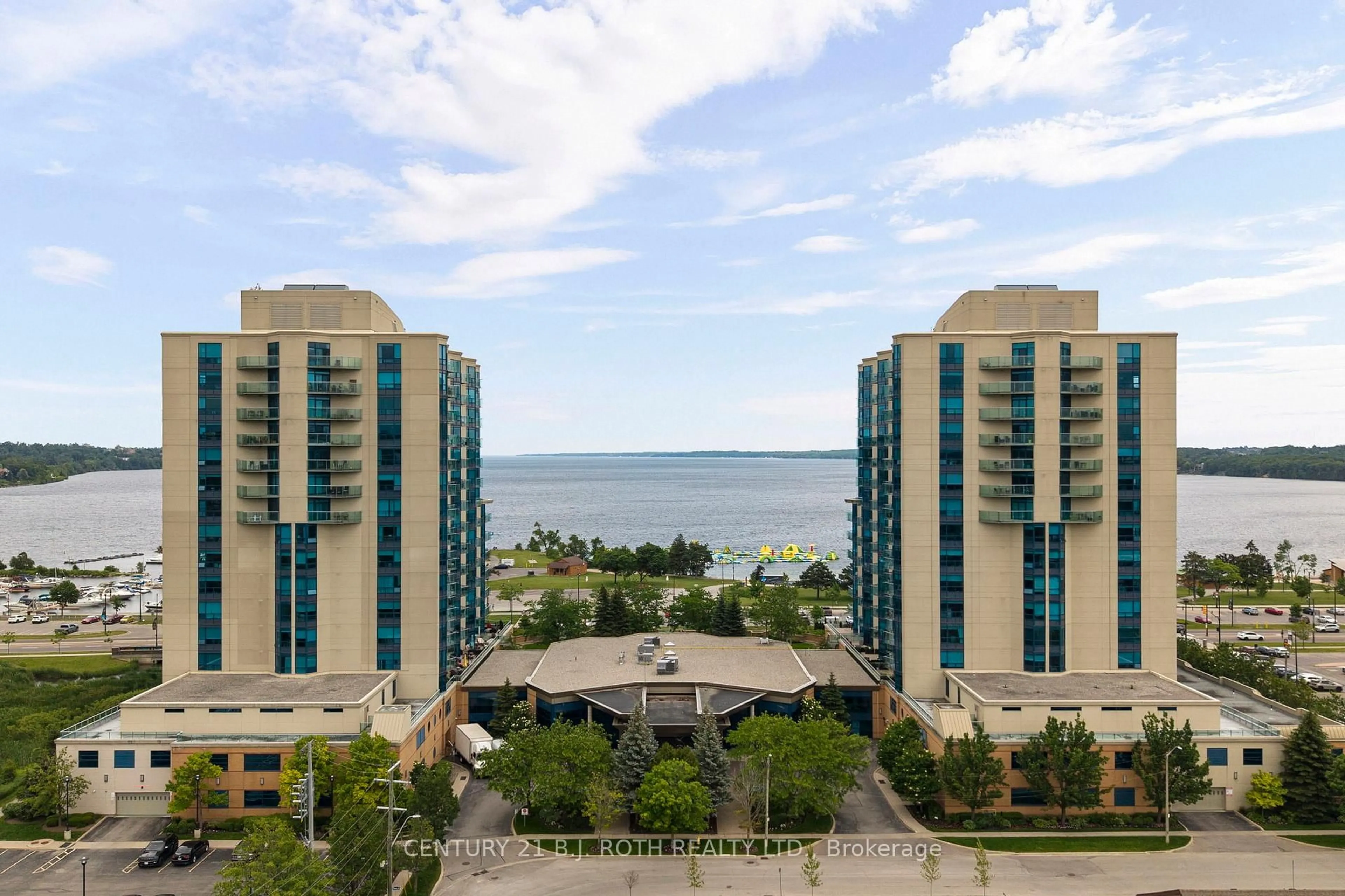 A pic from outside/outdoor area/front of a property/back of a property/a pic from drone, water/lake/river/ocean view for 37 Ellen St #1310, Barrie Ontario L4N 6G2