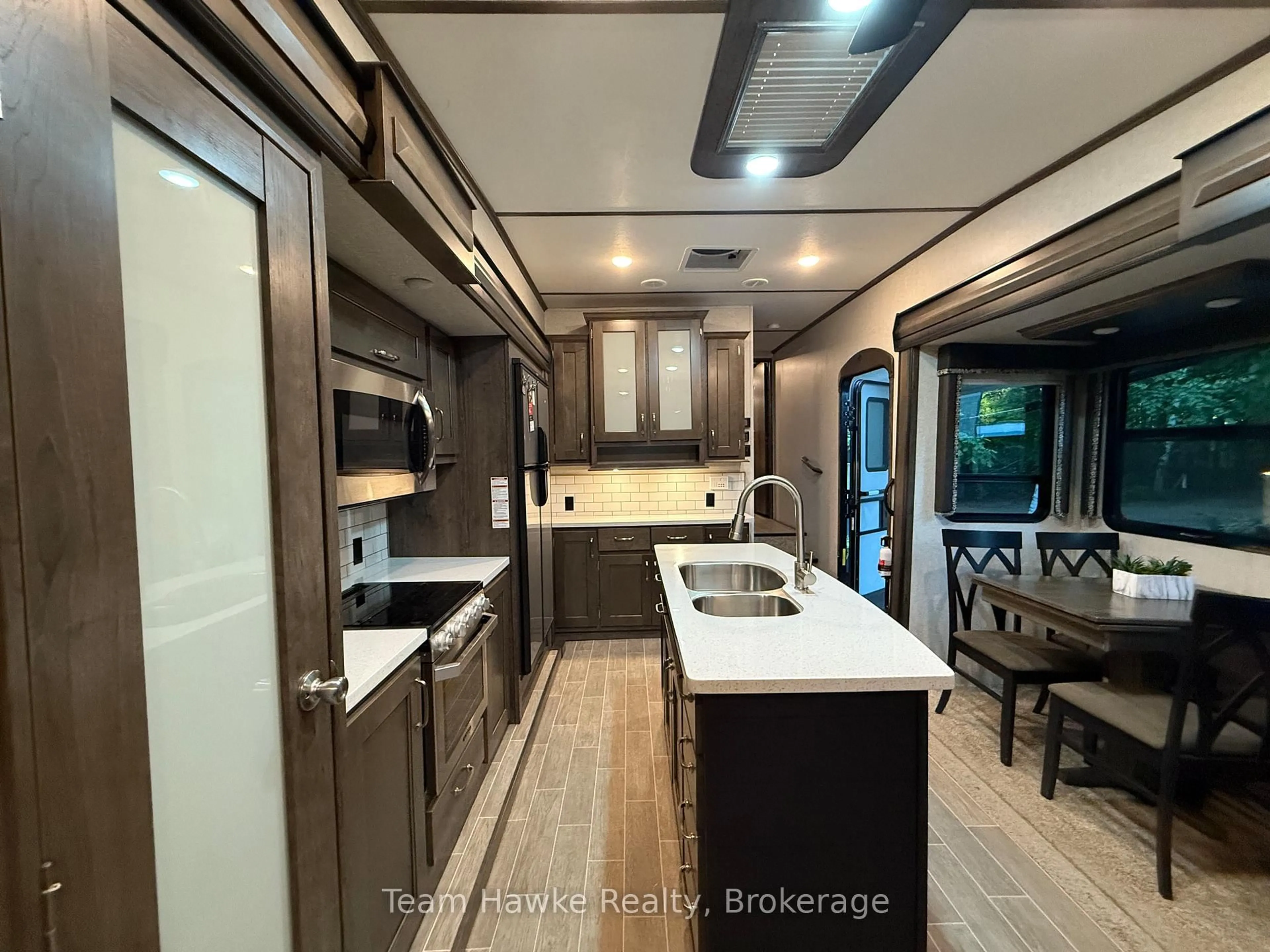 Open concept kitchen, unknown for 2920 Old Penetanguishene Rd #104, Springwater Ontario L0L 1P0