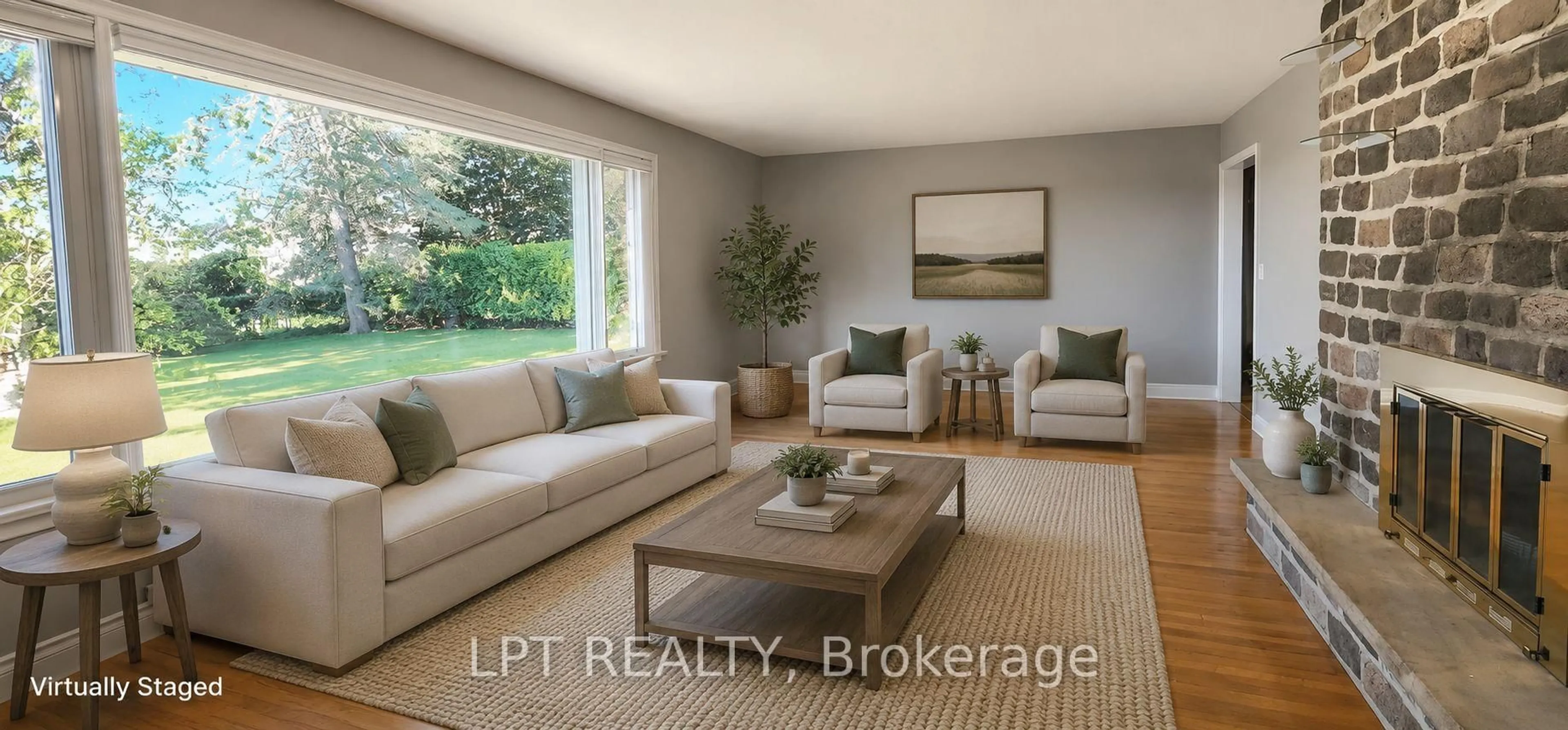 Living room with furniture, wood/laminate floor for 585 Mapleview Dr, Barrie Ontario L9J 0C3